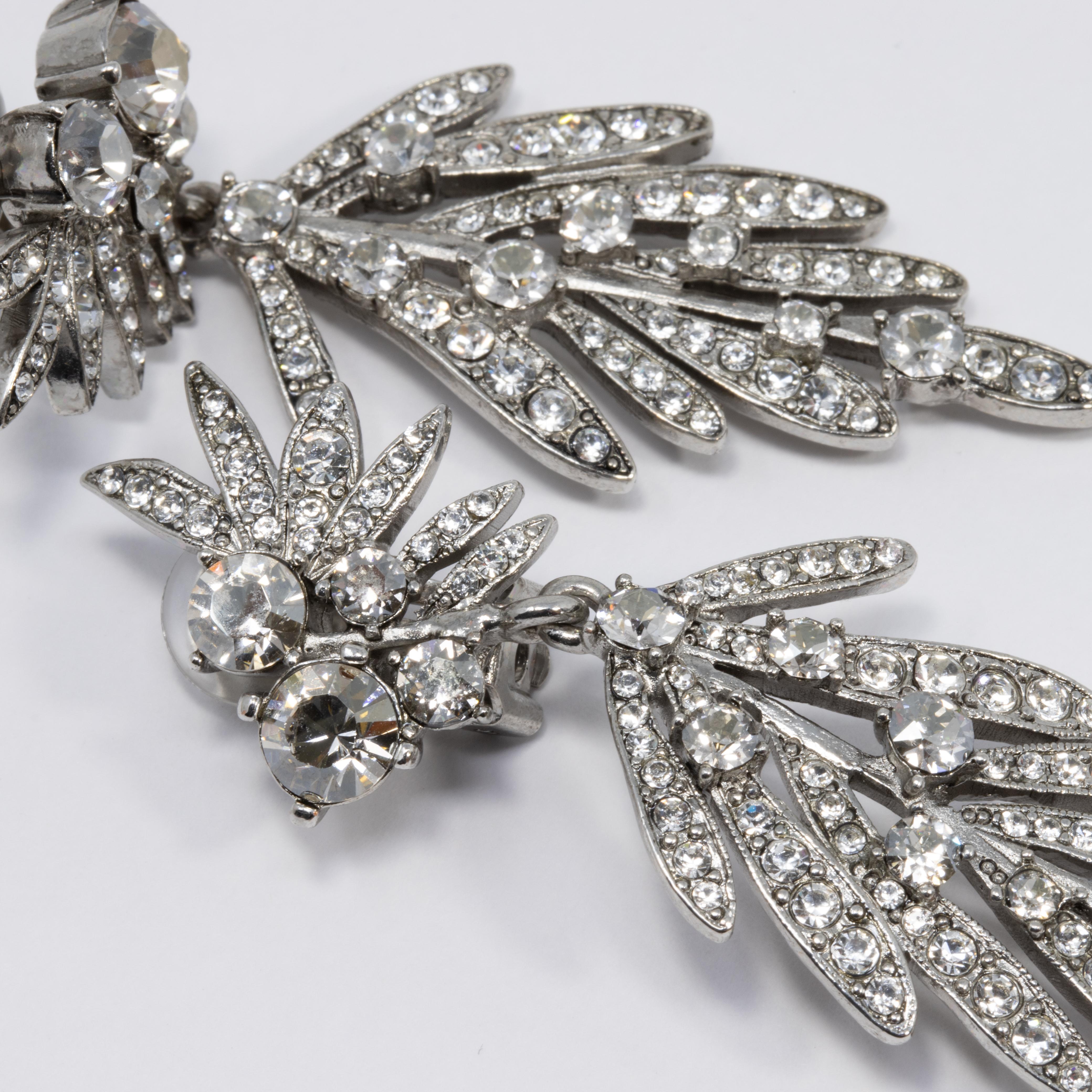 Contemporary Oscar de la Renta Tropical Leaf Clear Crystal Dangling Clip On Earrings, Silver