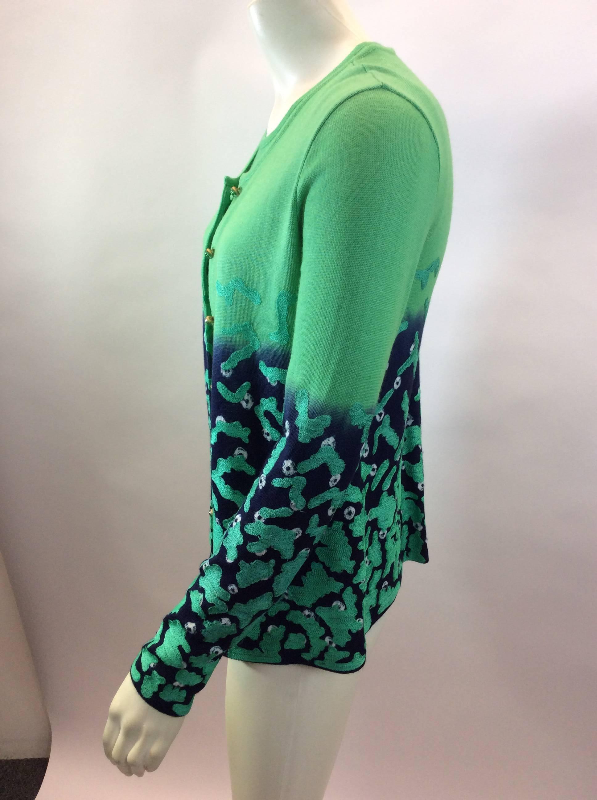 Oscar de la Renta Two Piece Green Sweater Set
Made in Italy
$199
Size Small
Blouse:
Length 21