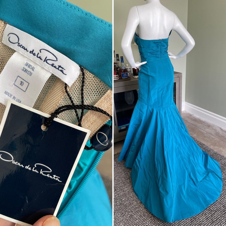 Oscar de la Renta Vintage 90's Strapless Turquoise Blue Taffeta Mermaid Dress with Train.
Full inner corset
Size 10 but runs small
 Bust 34