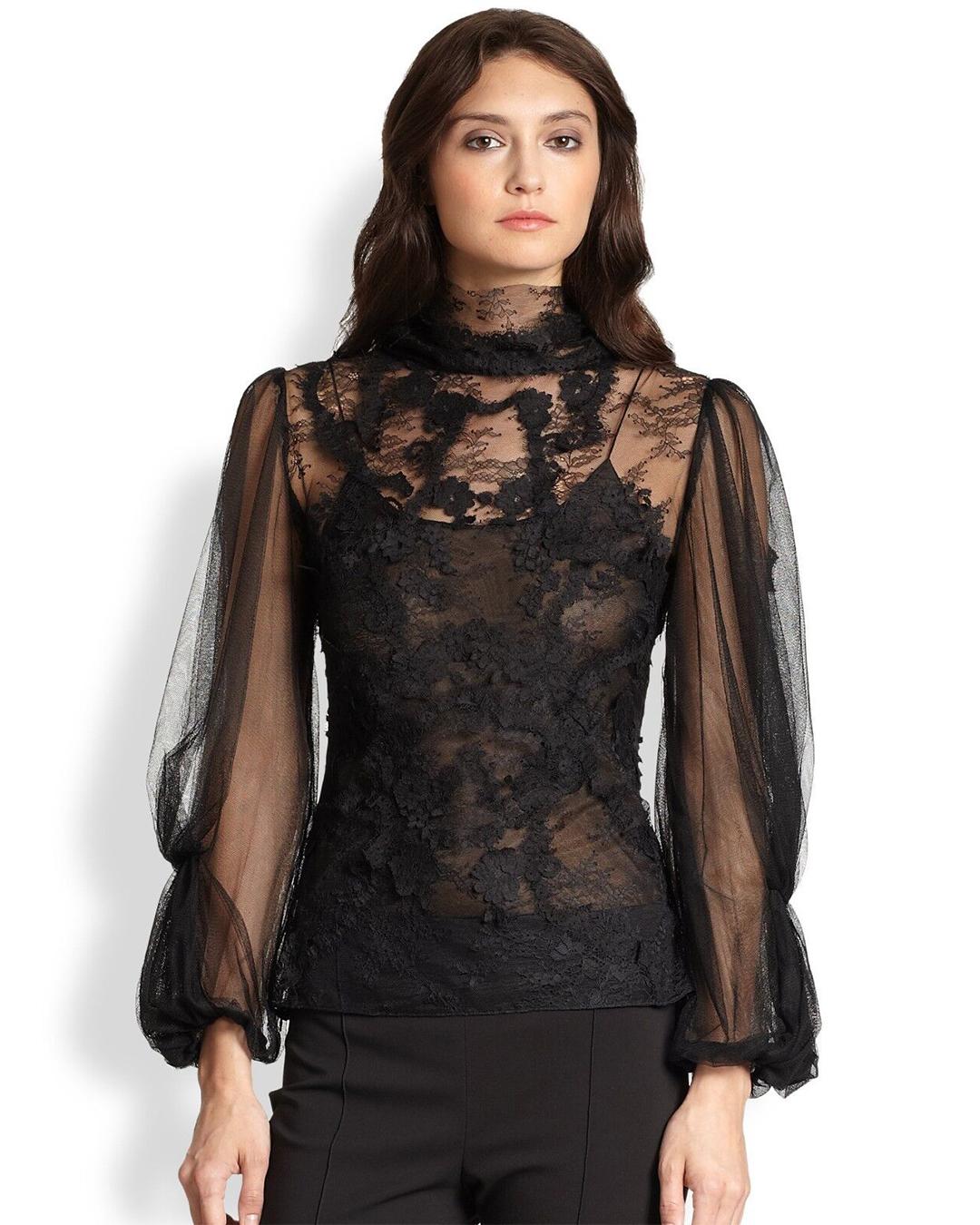 LOVE LALI Vintage

Oscar de la Renta
Sheer floral embroidered lace blouse with ruched balloon style sheer tulle sleeves
Turtleneck 
Can be worn tucked in or out

Composition:
No composition label 

Size:
No size label - estimated to be a US 2 - 4.