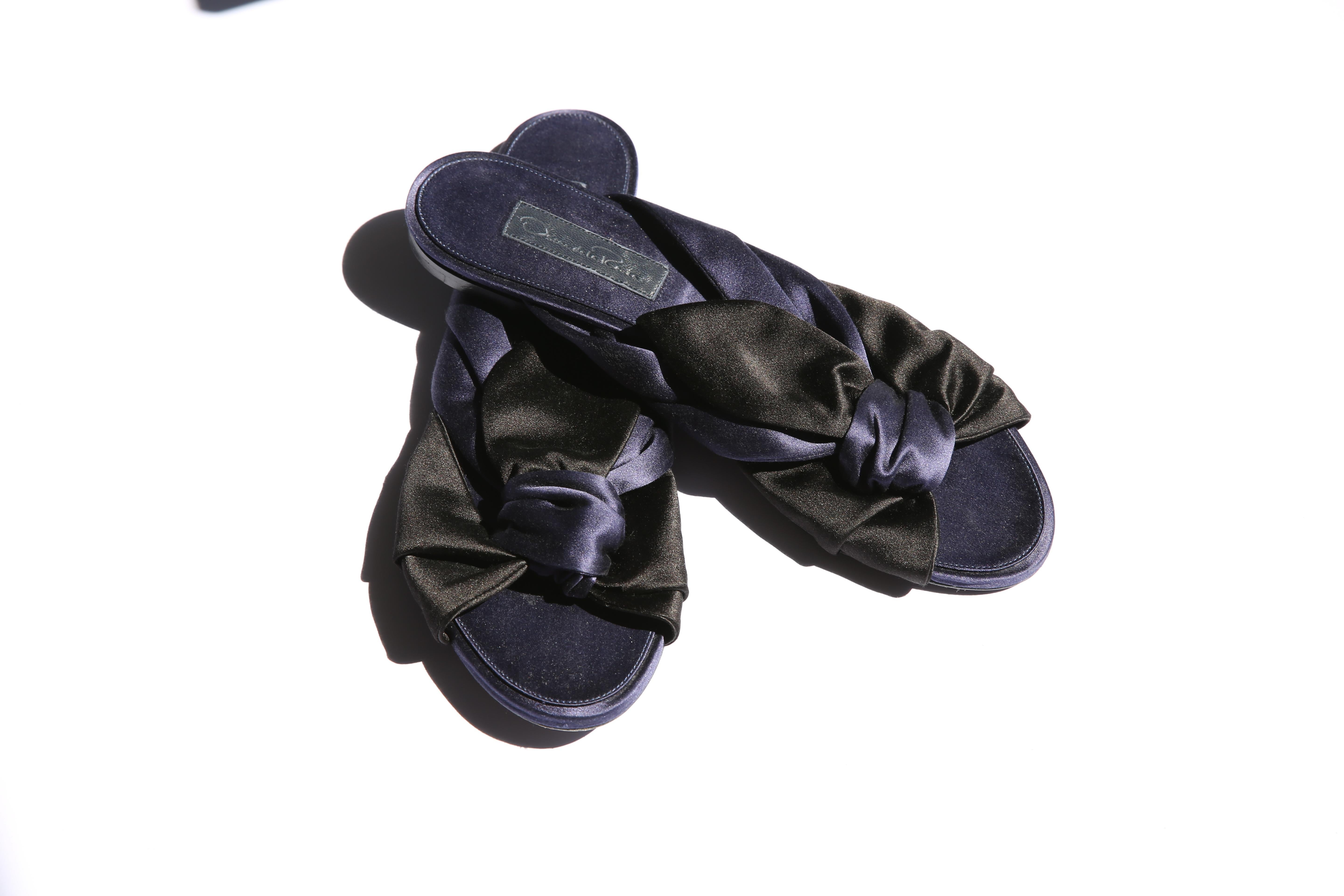 black slides with bow