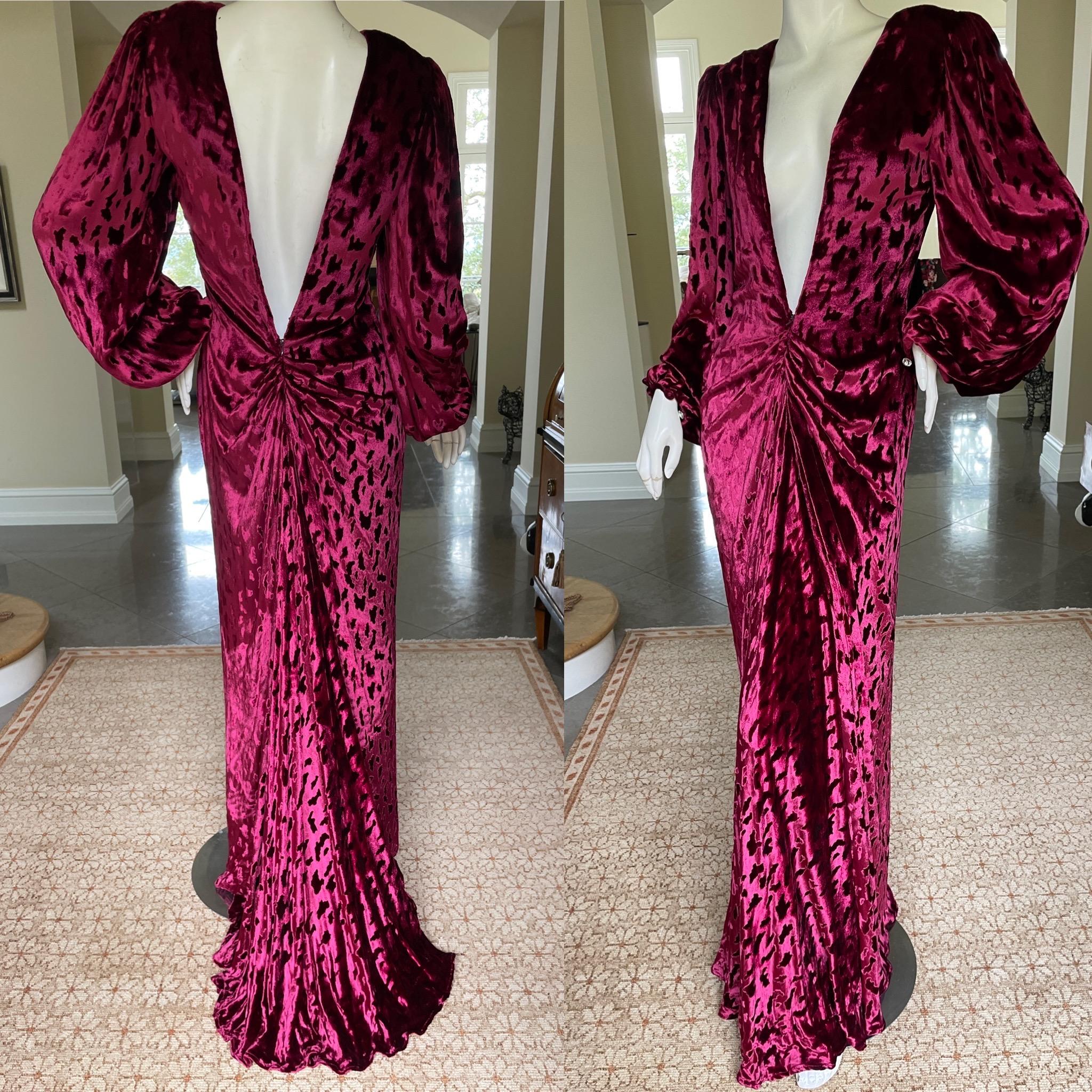 Oscar de la Renta Vintage Red Silk Velvet Mermaid Dress with Fishtail Back.
Luxurious leopard spot red velvet with plunging back. I also show it turned around, it looks amazing with the plunge in front. Cut on the bias, there is a lot of stretch.
 