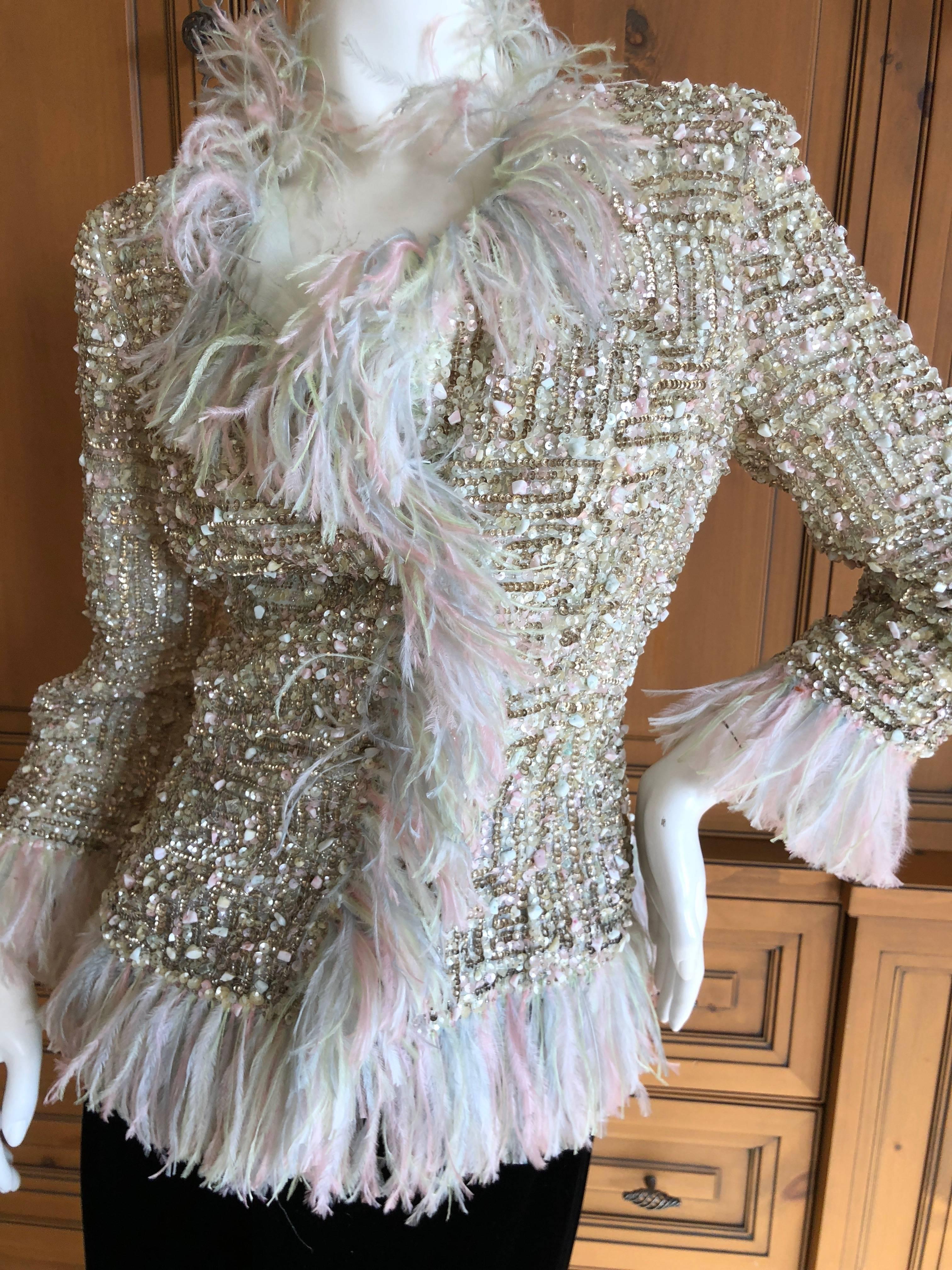 Oscar de la Renta Vintage Sequin Embellished Ostrich Feather Trim Evening Jacket.
Please use zoom feature to see the incredible details.
Simply Scrumptious
 Size 8
Bust 38