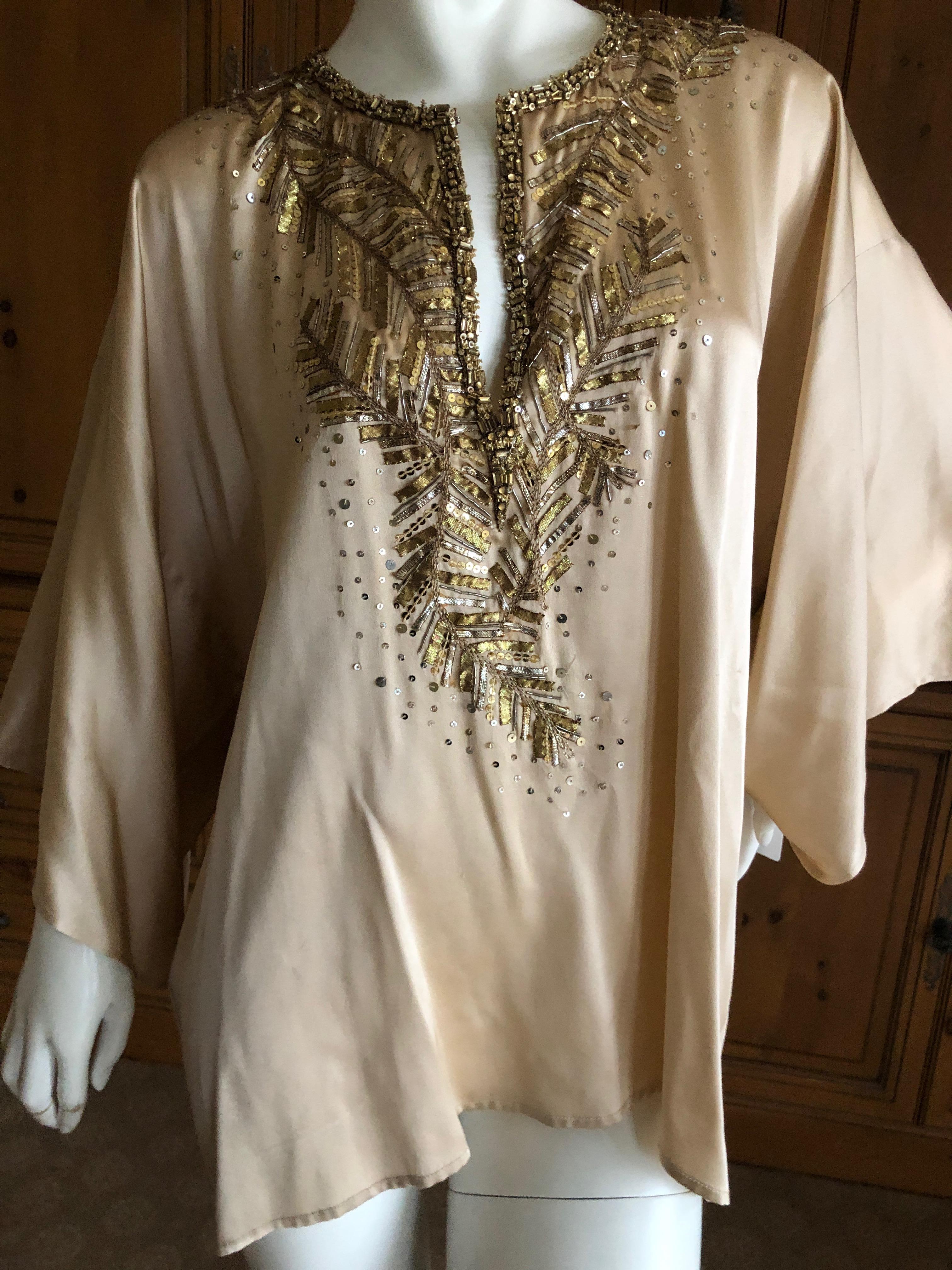 Oscar de la Renta Vintage Silk Mini Caftan Top with Embellishments
Simply Stunning. Please use the zoom feature to see al the remarkable details.
Size L or XL
 Bust 46