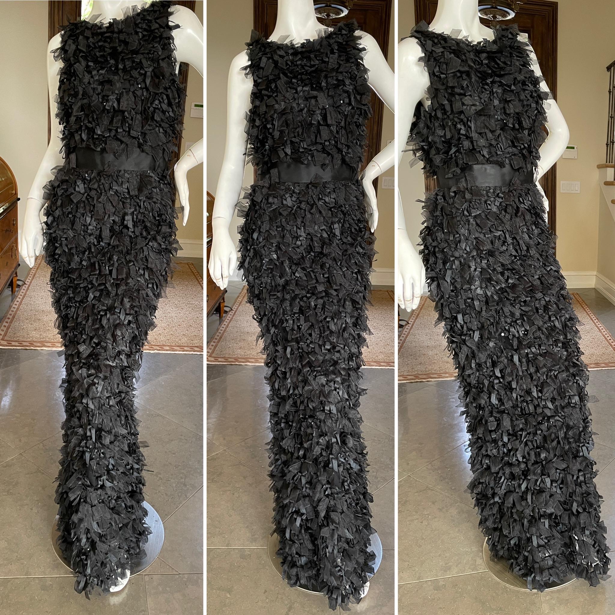 Oscar de la Renta Vintage Sleeveless Black Fringed Evening Dress
Stunning. Please use the zoom feature to see all the details.
 Size 10
Bust 40