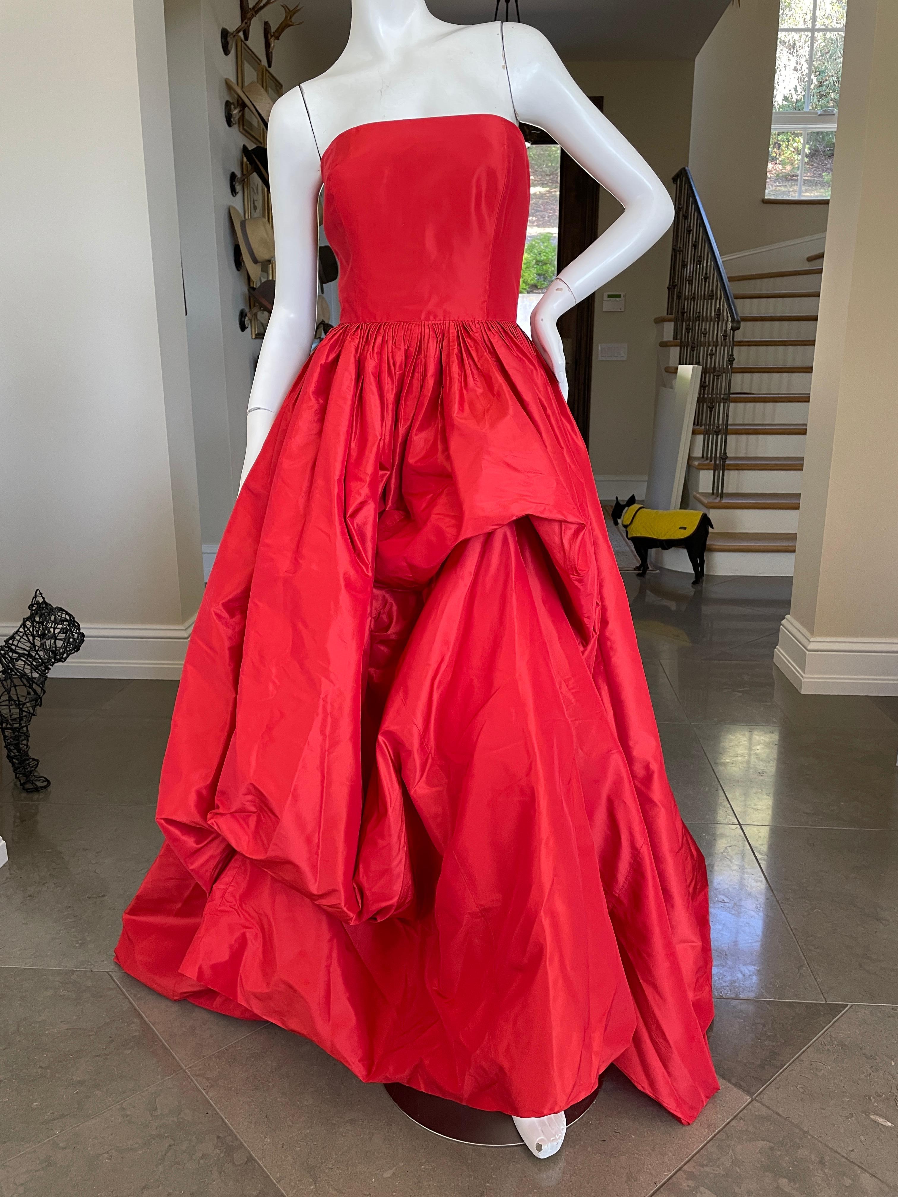 Oscar de la Renta Vintage Strapless Red Evening Dress.
  Stunning. Please use the zoom feature to see all the remarkable details.
The skirt is unlined and very billowy, I show it with a fan blowing it to accentuate it's volume.
 Size 6
Bust 34