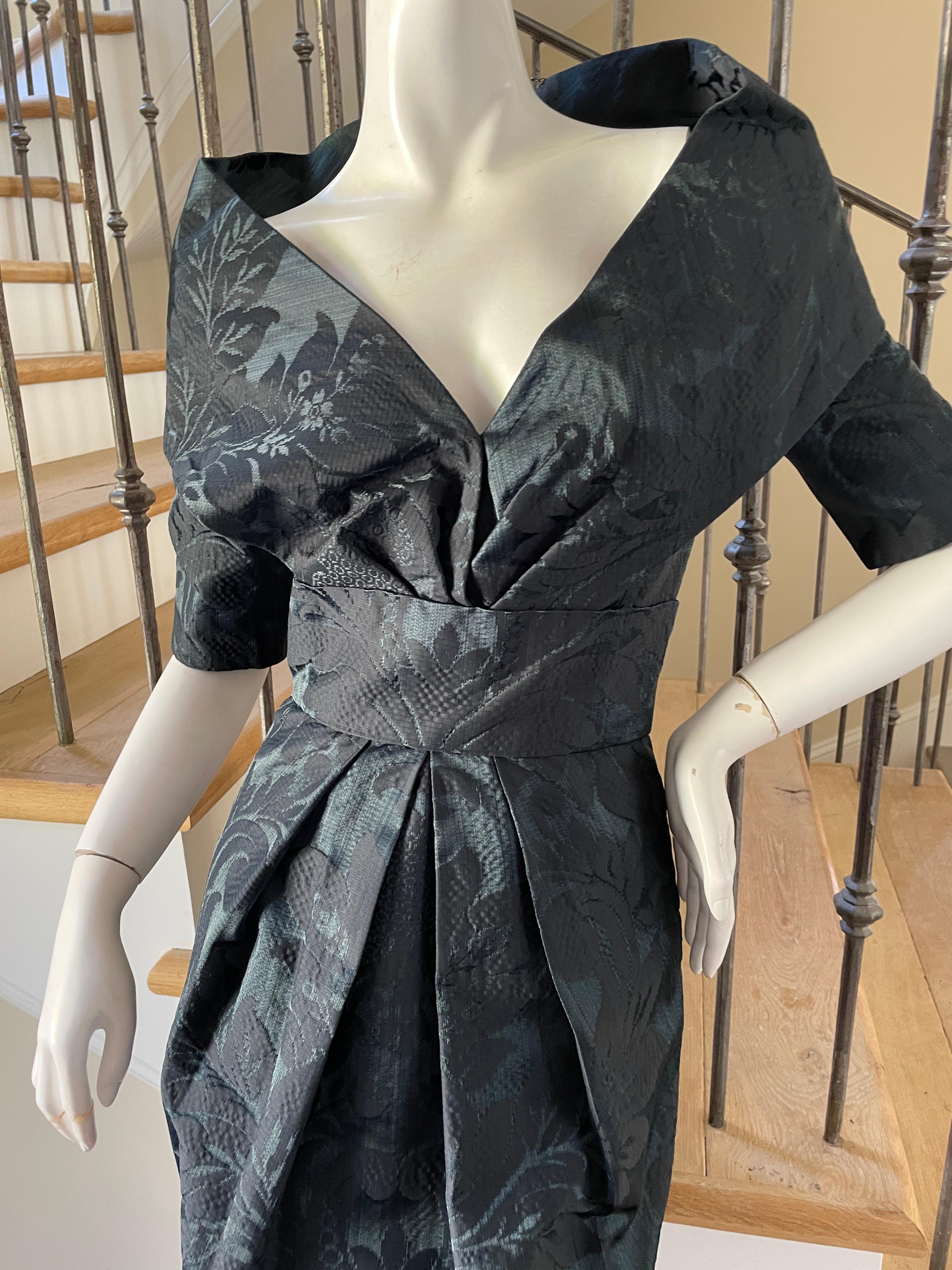 Oscar de la Renta Teal and Black Jacquard Cocktail Dress with Portrait Collar.
Simply Stunning.
Size 4
Bust 34