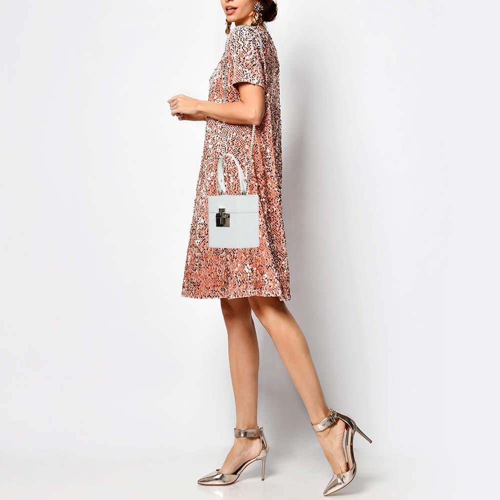 Designer bags are ideal companions for ample occasions Here we have a fashion meets functionality piece crafted with precision. It has been equipped with a well sized interior that can easily fit your small essentials.