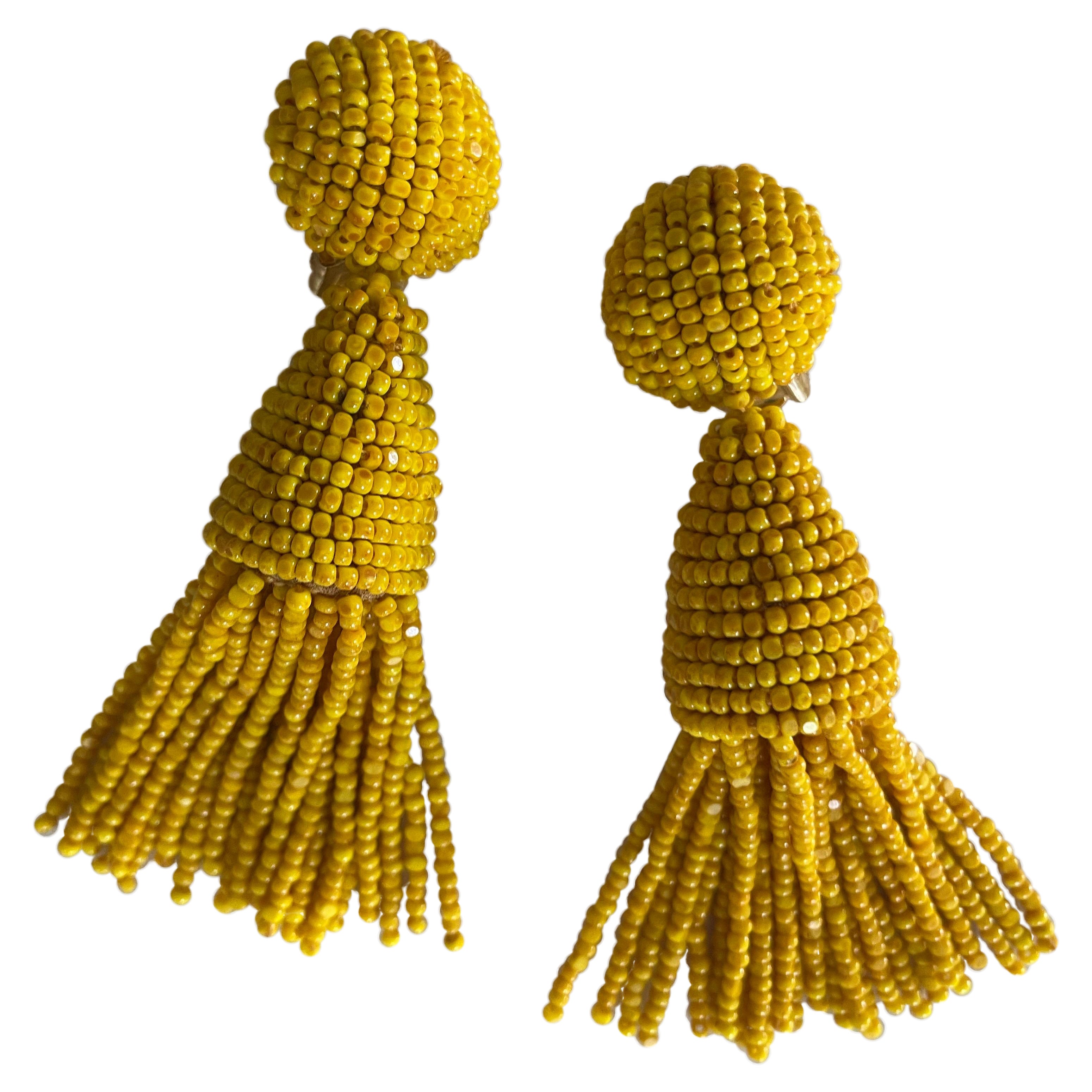 Pendientes de clip con borla de cuentas amarillas Oscar De La Renta en venta