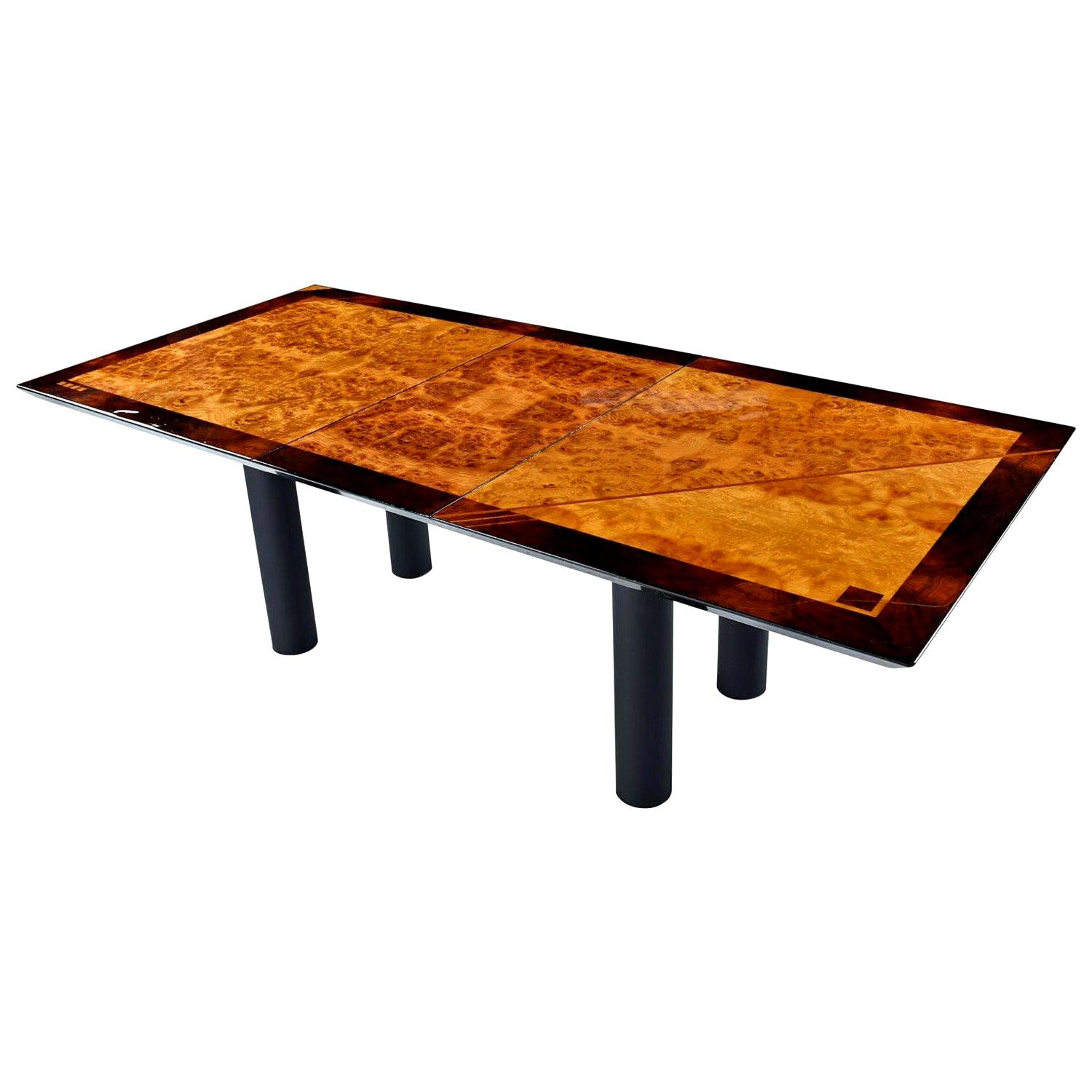 Design aficionados will spot the Italian modern pedigree of this dining table from a mile away. Everyone else will just recognize that it’s dripping with cool. This burl bird's-eye maple and rosewood beauty was designed by Oscar Dell'Arredamento for