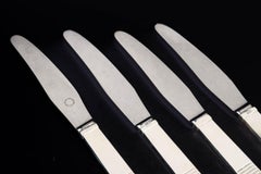 Oscar Gundlach-Pedersen for Georg Jensen. Four "Parallel" lunch knives.