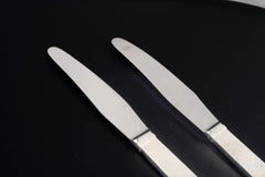 Oscar Gundlach-Pedersen for Georg Jensen. Two "Parallel" lunch knives.
