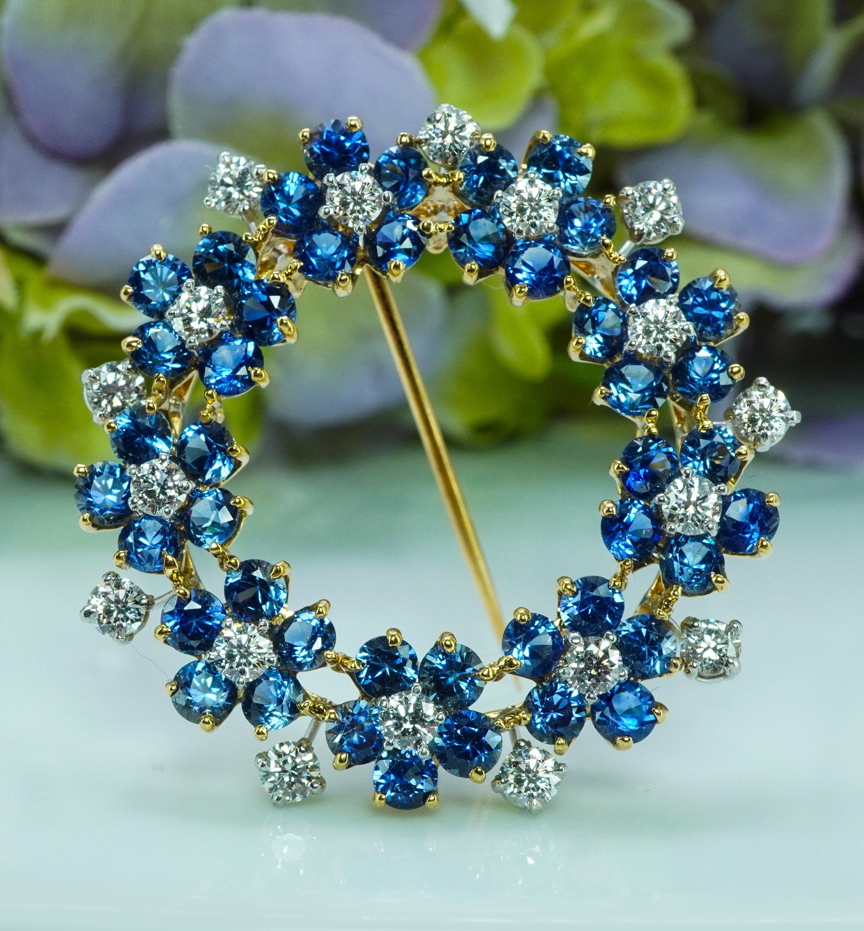  Oscar Heyman 10.35ct Sapphire Diamond Brooch 18K Gold Platinum OHB Certified Large

This is a gorgeous piece by Oscar Heyman Brothers in 18K yellow gold and platinum. It is a numbered piece of jewelry with the Oscar Heyman certificate. The brooch