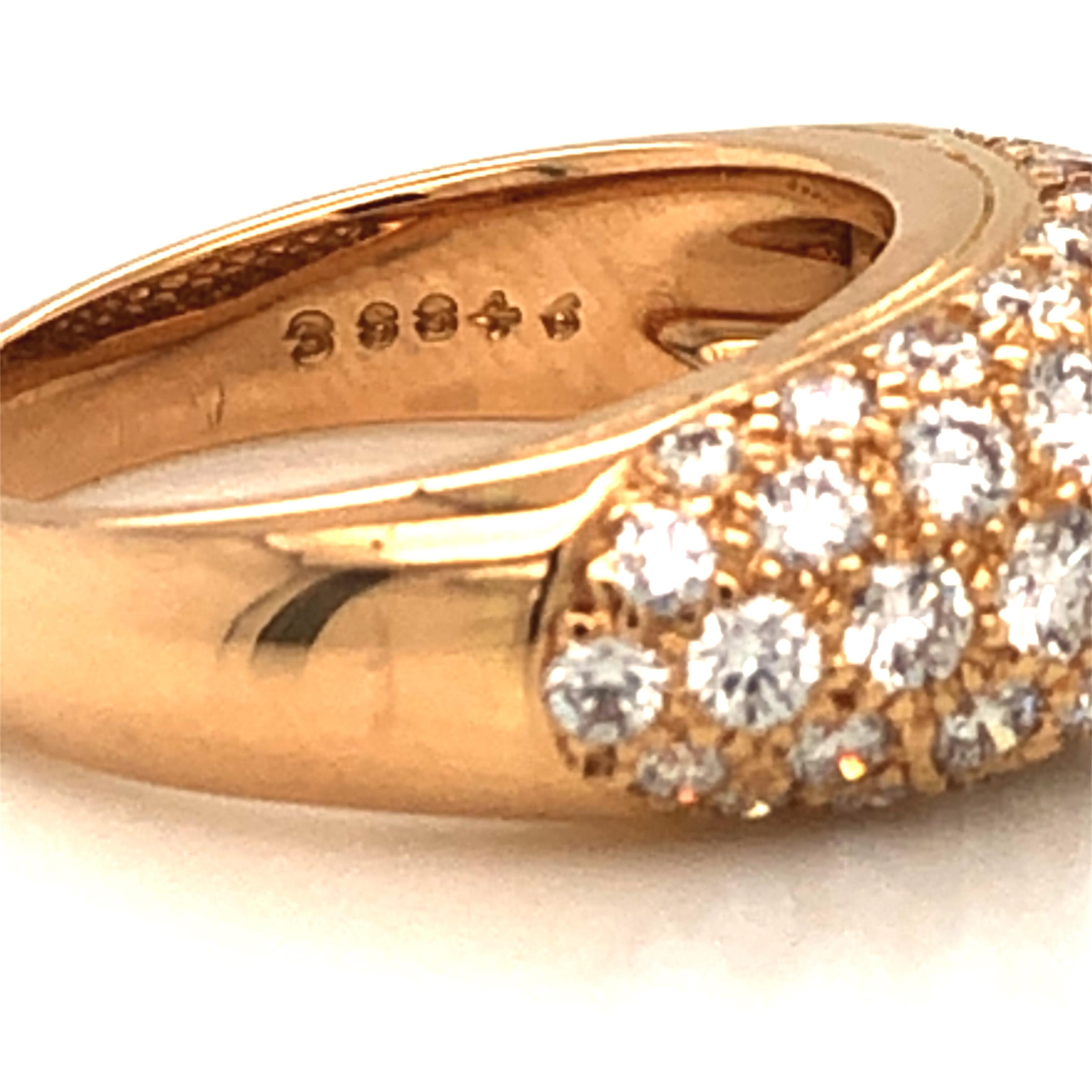 Oscar Heyman 18kt yellow gold dome ring contains 49 round diamonds weighing 1.84cts (F-G/VS) that are bead set. It is stamped with the makers mark, 18K, and serial number 38846. Dome height is 6.5mm. This is a beautiful classic design that pops on