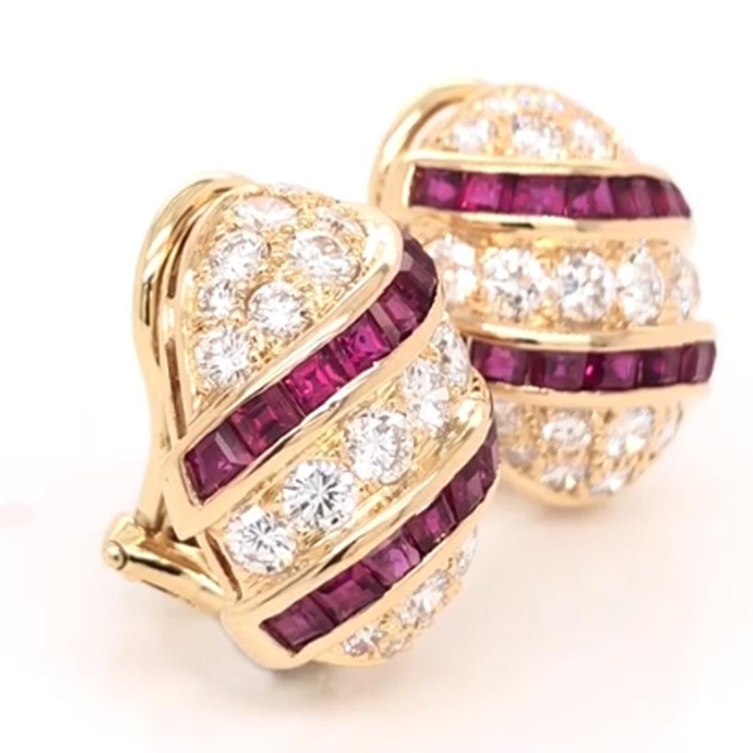 This pair of Oscar Heyman 18kt yellow gold earrings contains 2.82cts of calibré rubies in two elegant swirls around an oval of 50 round diamonds weighing 2.90cts (F-G/VS+). The rubies are hand by Oscar Heyman's in-house lapidary and are channel set.