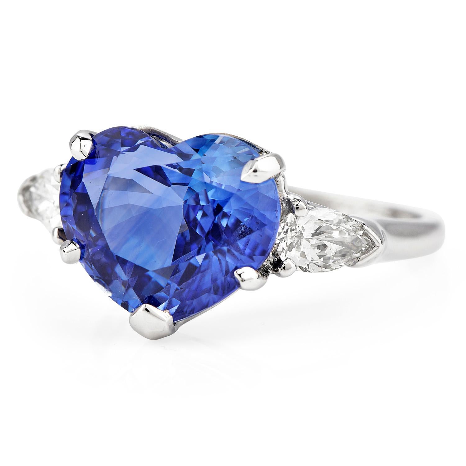 Reminiscent of the famous Heart of the Ocean piece in the Titanic.

Carefully crafted in solid Platinum, Featuring Vibrant GIA certified

Natural Curundom Blue Sri Lankan Sapphire Heart-cut, prong-set, weighing 6.02 carats, Measuring 9.70 x 11.60 x