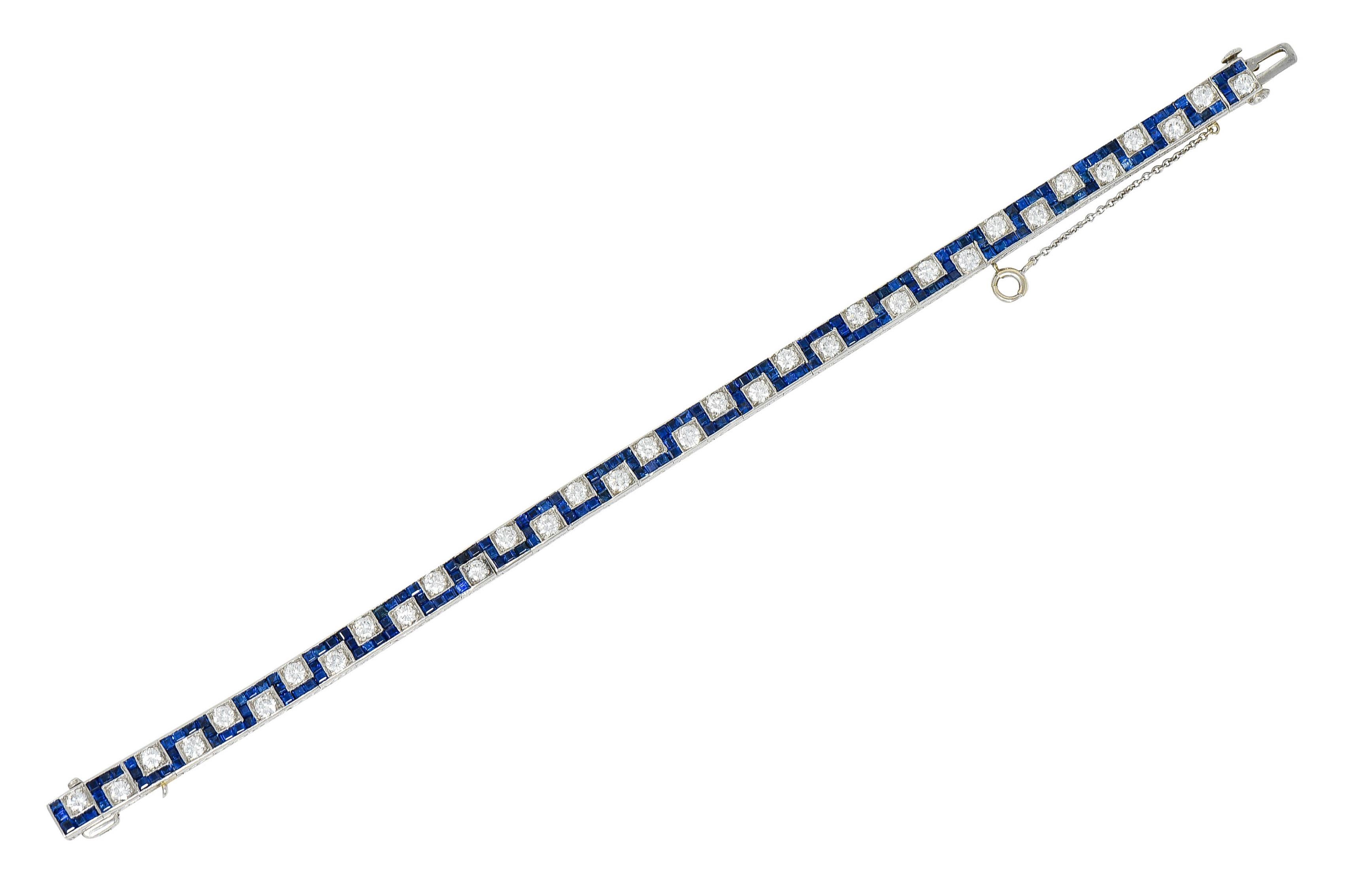 Line bracelet is comprised of square form links - with a deeply engraved side profile

Featuring round brilliant cut diamonds weighing in total approximately 3.45 carats - G/H color with VS clarity

With calibrè cut sapphires set in a zig zagged