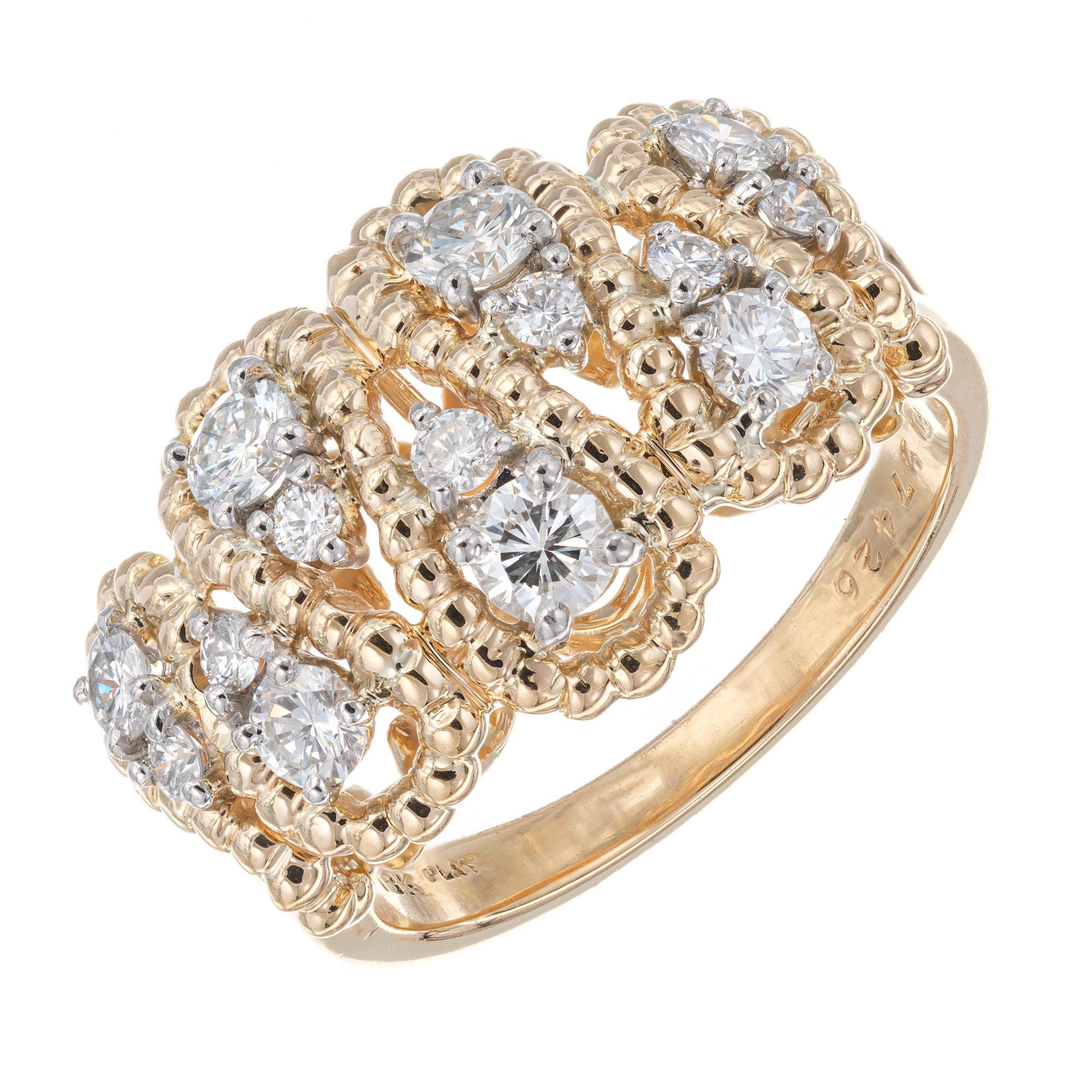 Anillo de cóctel de diamantes Oscar Heyman de los años 60, en oro amarillo y platino. Engastada con 14 diamantes redondos de talla brillante con garras de platino. 

14 diamantes redondos talla brillante, G-H VS aprox. 0,85cts
Talla 6.25 y grande