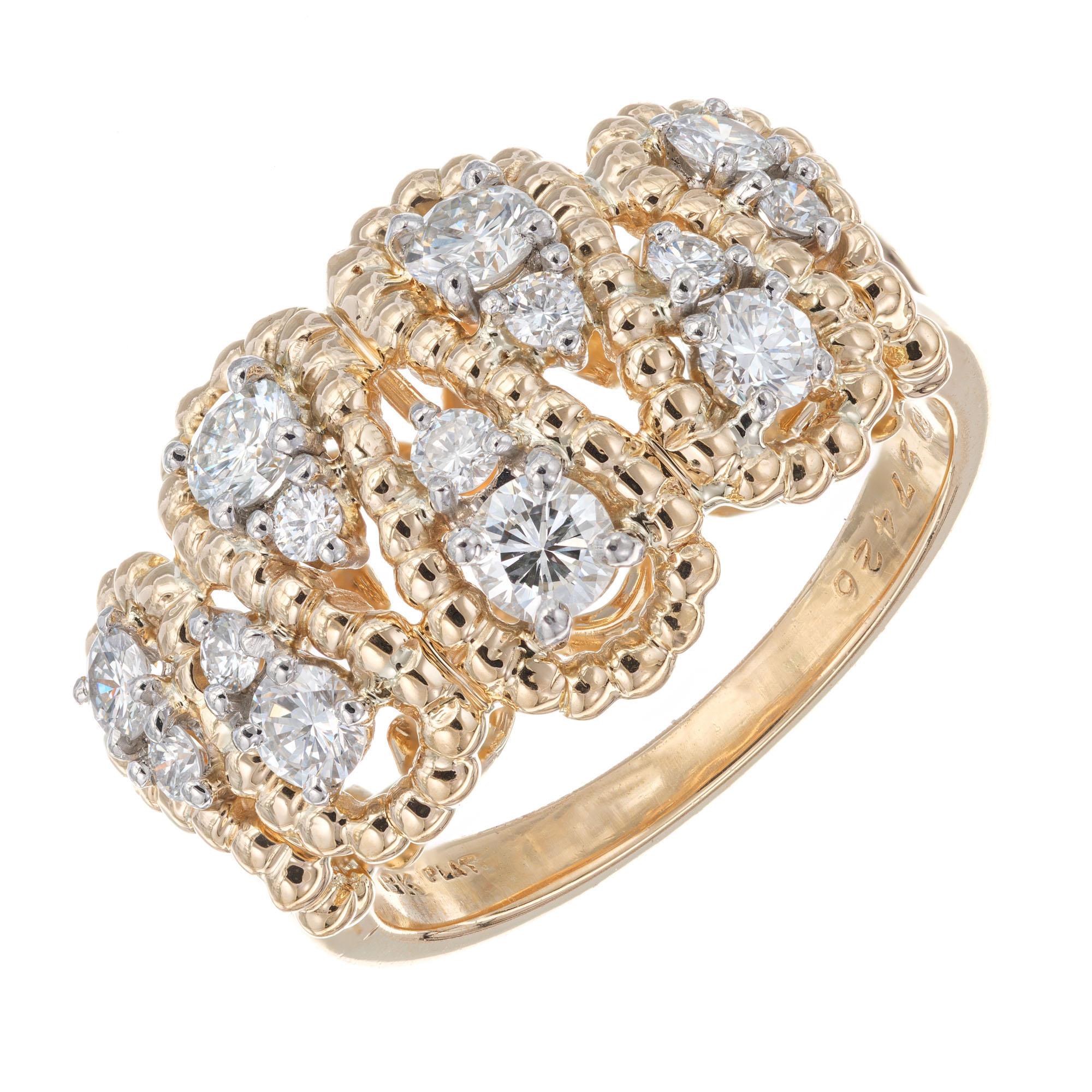 1960's Oscar Heyman diamond cocktail ring in yellow gold and platinum. Set with 14 round brilliant cut diamonds with platinum prongs. 

14 round brilliant cut diamonds, G-H VS approx. .85cts
Size 6.25 and sizable 
18k yellow gold 
Platinum 
Stamped: