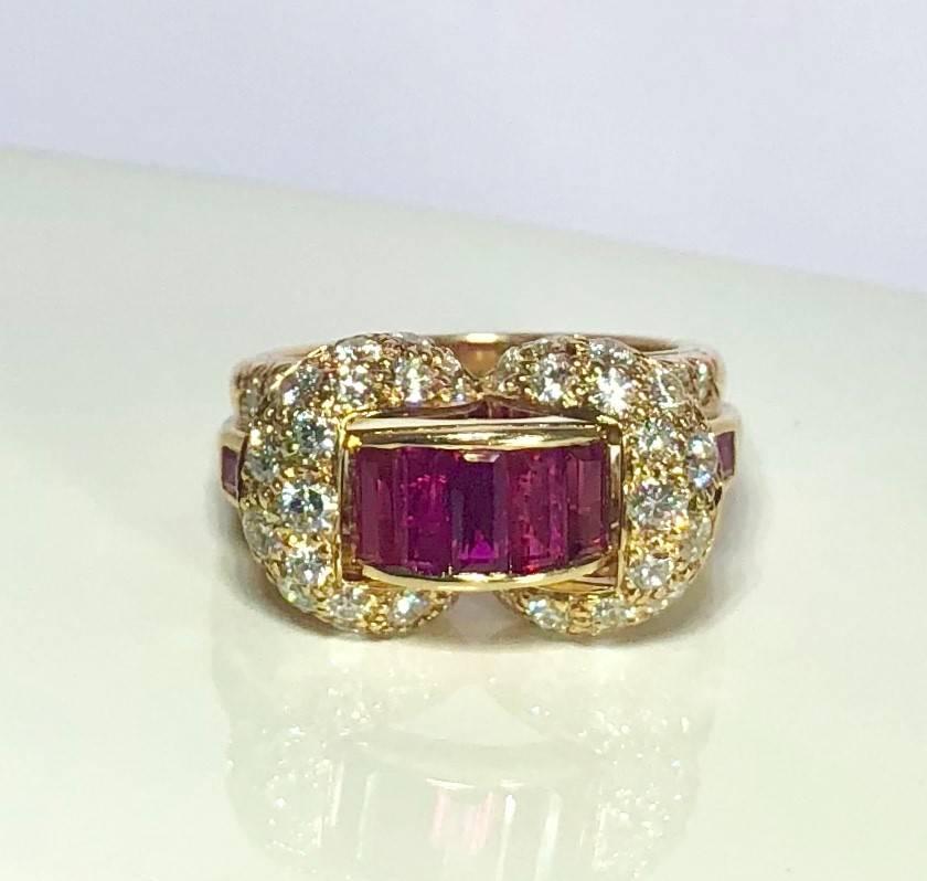  Oscar Heyman and Brothers  18 karat yellow gold, Ruby and Diamond cocktail ring. This Exquisite piece is created in 16.3 dwt (9.8 grams) of  18 karat yellow gold and is adorned with 2.76 carat total weight Ruby baguettes strategically placed in