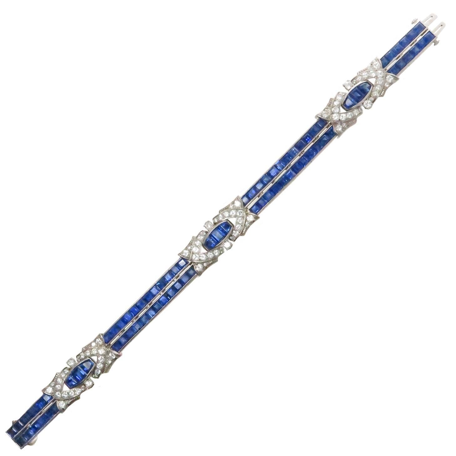 Circa 1930s Oscar Heyman Art Deco Platinum Bracelet, very soft and flexible and measuring 7 inches in length, 7/16 inch wide and is set with 72 extremely fine color No heat Square cut Sapphires totaling approximately 8 Carats and 9 Tapered Sapphires
