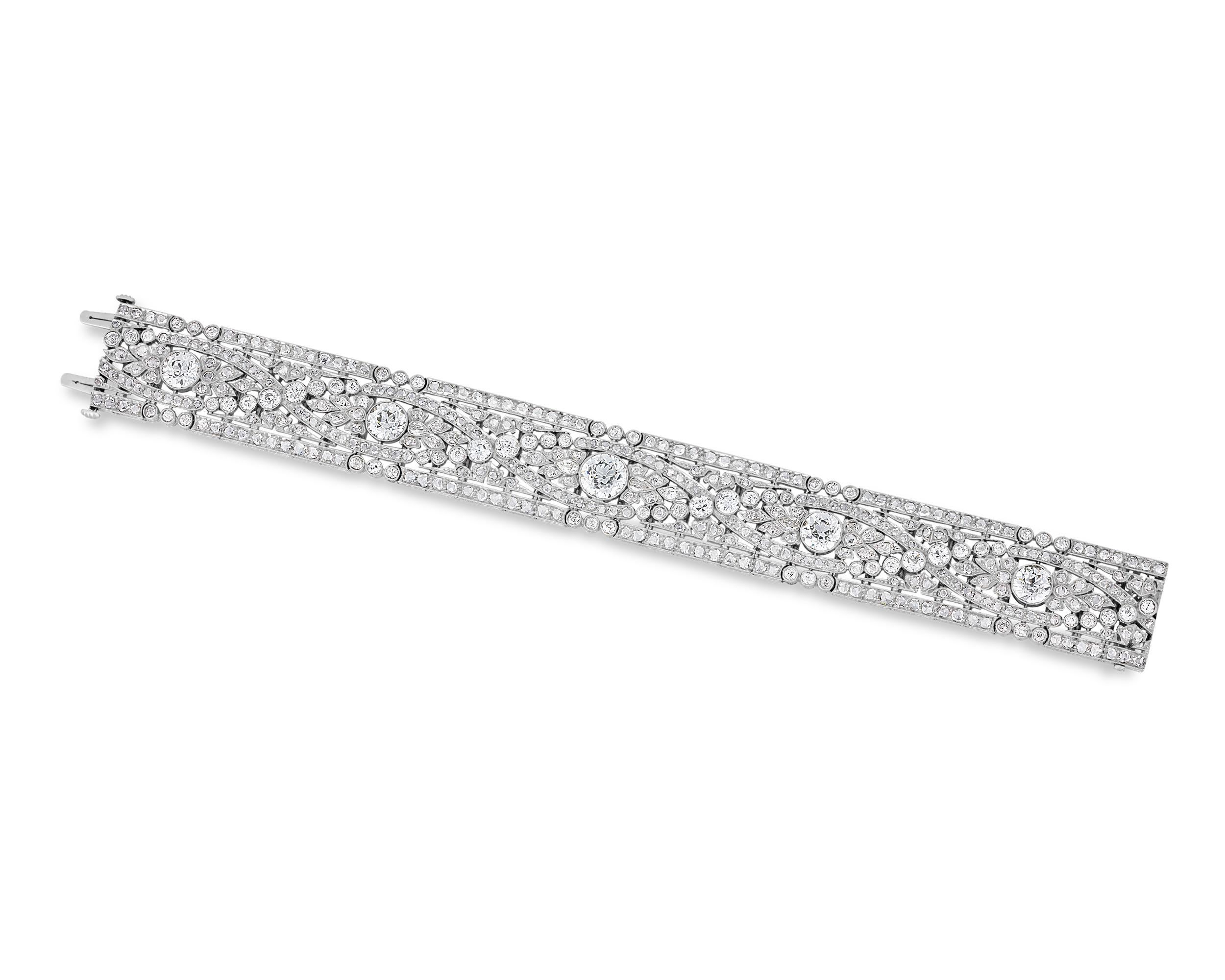 This dazzling Belle Époque diamond bracelet by the renowned Oscar Heyman is a masterpiece of early 20th-century jewelry design. Crafted around 1920, it showcases a breathtaking array of Old European and rose cut diamonds in an intricate platinum