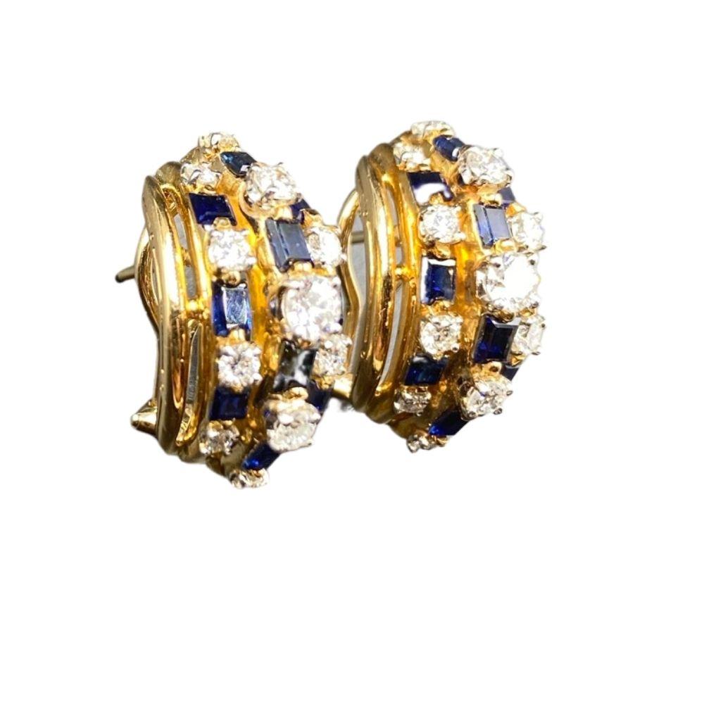 Oscar Heyman Blue Sapphire and Diamond cluster earring,  with a unique cascade of round diamonds and baguette sapphires.

Oscar Heyman & Brothers has created fabulous jewels for some of the world’s elite houses like Van Cleef and Tiffany, the pieces