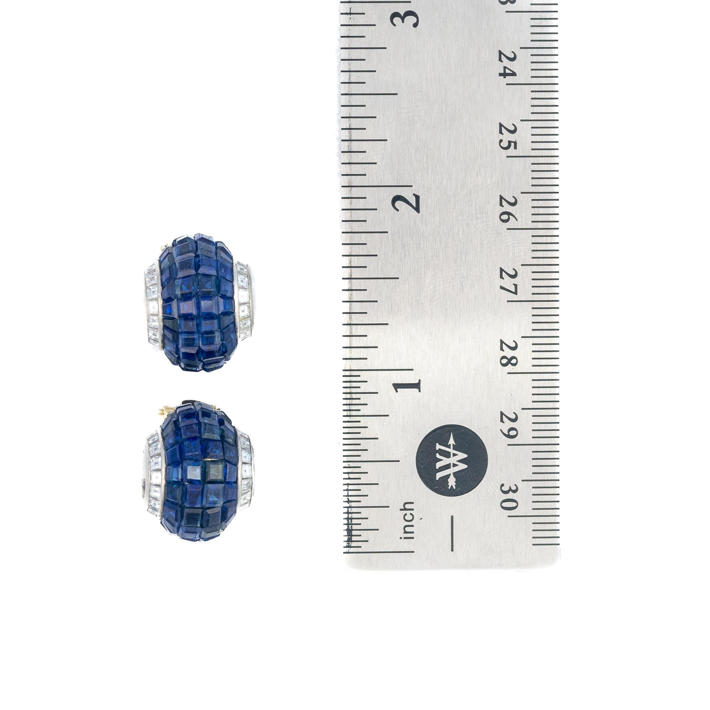 Oscar Heyman Bros. Invisible Set Sapphire & Diamond Earrings

A striking pair of earrings by Oscar Heyman, crafted in 18k white gold and platinum. These elegant earrings feature four rows of vivid blue square-cut sapphires, meticulously arranged in