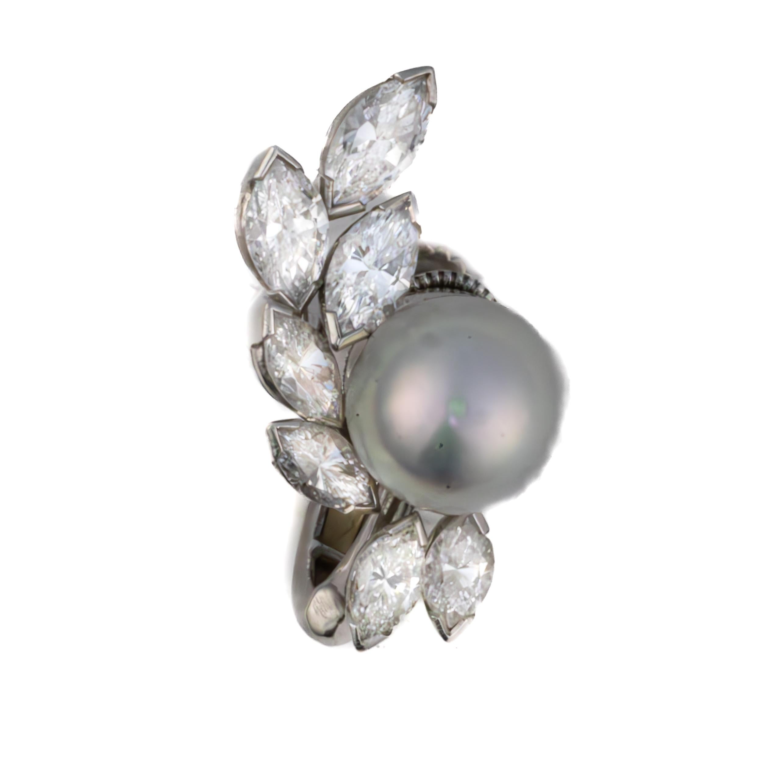 Oscar Heyman Bros Orecchini di platino con perle e diamanti marquise

Descrizione: Questi orecchini Oscar Heyman Bros abbinano perle coltivate luminose a un'elegante serie di diamanti taglio marquise disposti in un raffinato motivo a foglia.