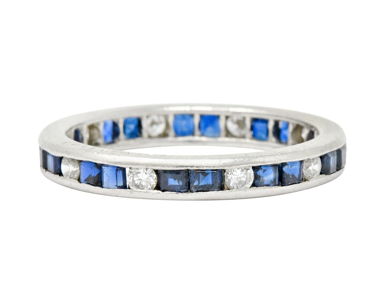 Eternity style band ring channel set fully around by square cut sapphire and round brilliant cut diamonds - alternating

Diamonds weigh in total approximately 0.30 carat - G/H color with SI clarity

Sapphires weigh in total approximately 0.80 carat