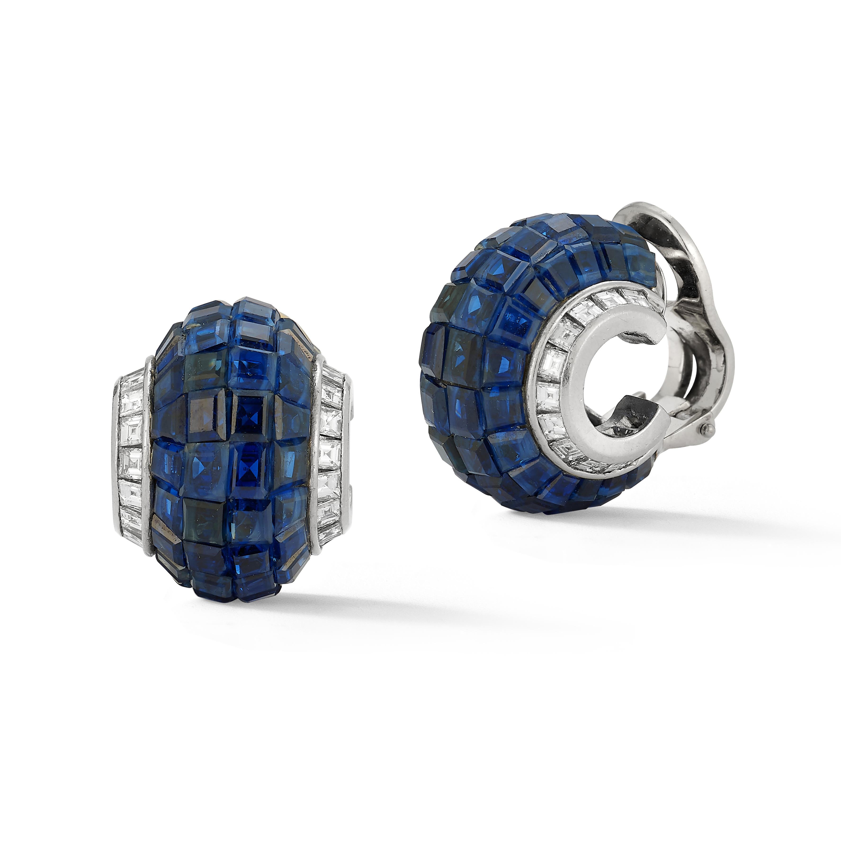 Oscar Heyman Brothers Invisible Set Sapphire & Diamond Earrings

A pair of earrings with 4 rows of square cut sapphires & 2 rows square cut diamonds set in platinum.

Sapphire Weight: 39.11 cts 
Diamond Weight: 1.72 cts 

Back Type: Clip