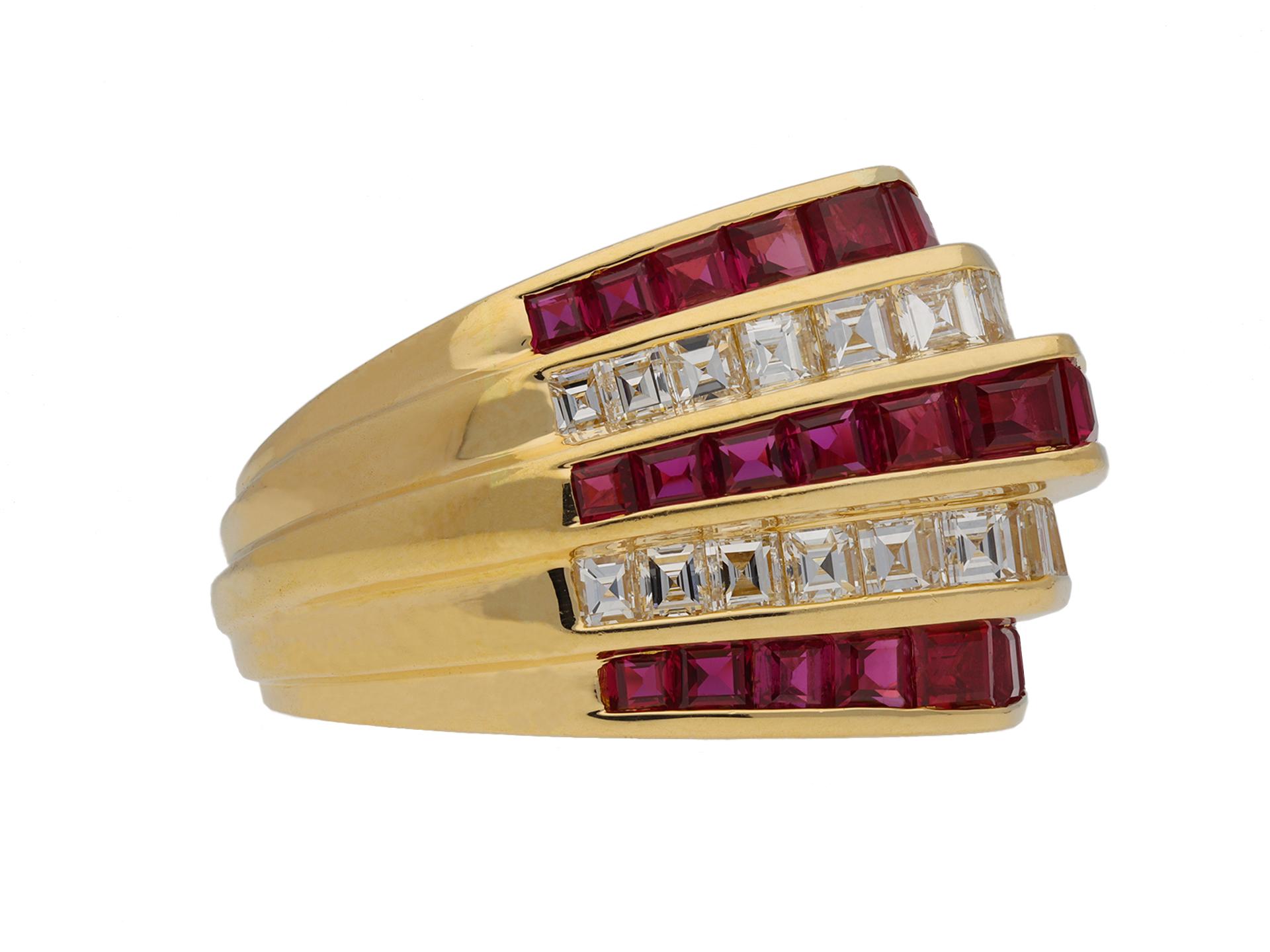 Oscar Heyman Brothers ruby and diamond ring. Set with twenty four square baguette cut diamonds in open back channel settings with rubover border and an approximate combined weight of 1.38 carats to two horizontal rows, alternated by thirty two