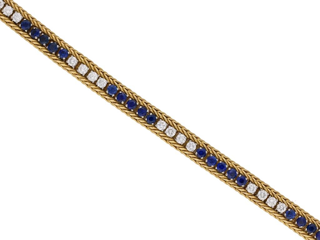 Oscar Heyman Brothers sapphire and diamond bracelet. Set with twenty nine round brilliant cut natural unenhanced sapphires in open back claw settings with a combined approximate weight of 2.90 carats, further set with twenty four round brilliant cut