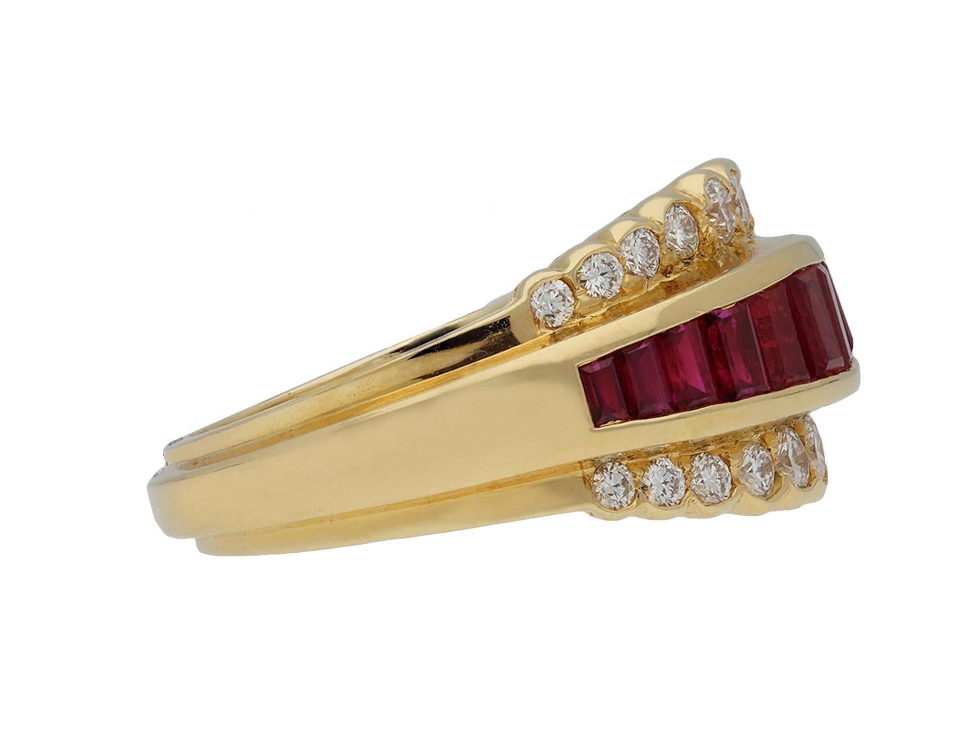 Vintage ruby and diamond ring by Oscar Heyman Brothers. Set with a central horizontal channel set row of thirteen natural rectangular tapered baguette cut rubies in open back rubover settings with an approximate combined weight of 1.80 carats,