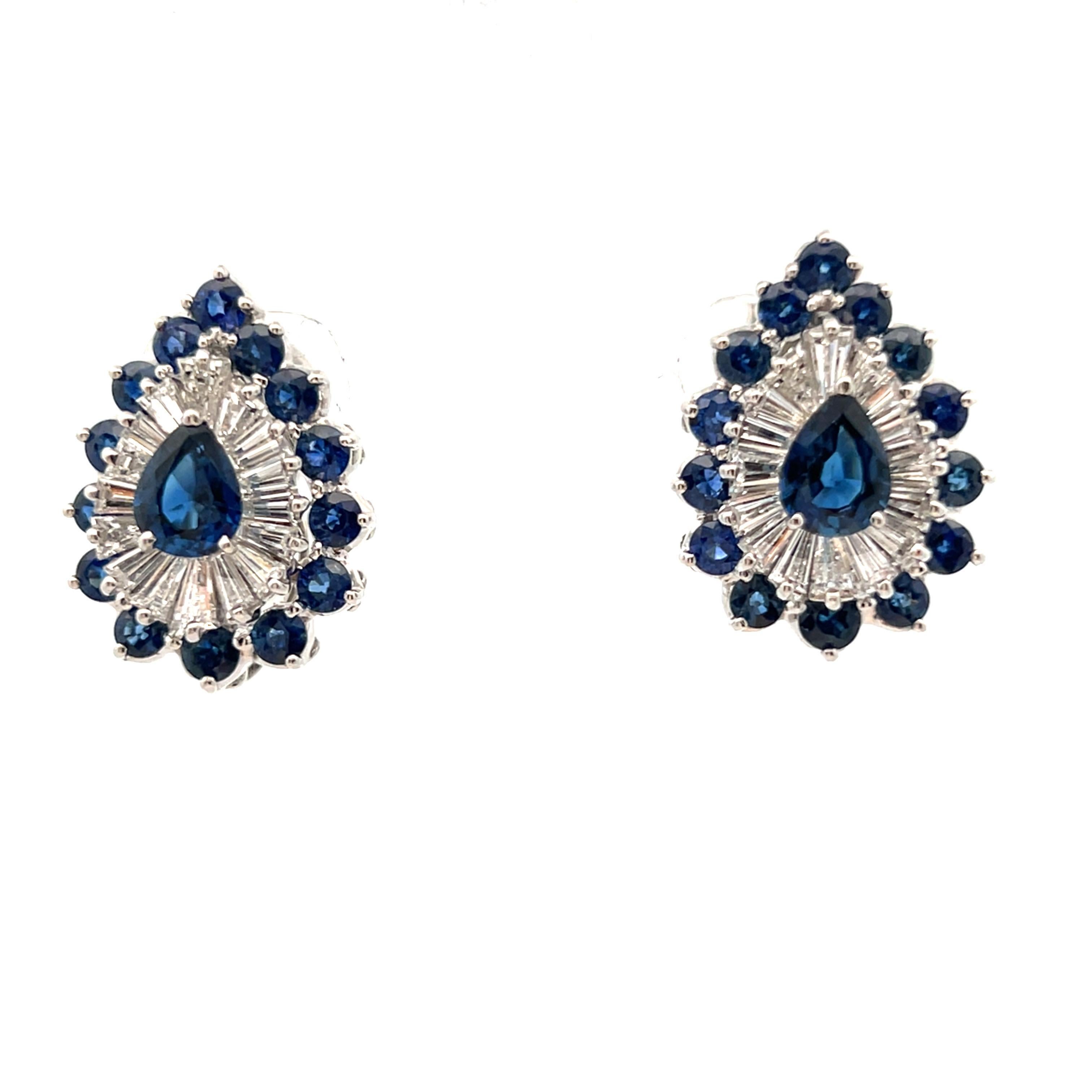 Oscar Heyman Day and Night Invisible Set Sapphire Earrings

A pair of Oscar Heyman day and night earrings featuring pear-shaped sapphires at the tops, accented with round-cut sapphires and tapered baguette diamonds. The detachable drops showcase a
