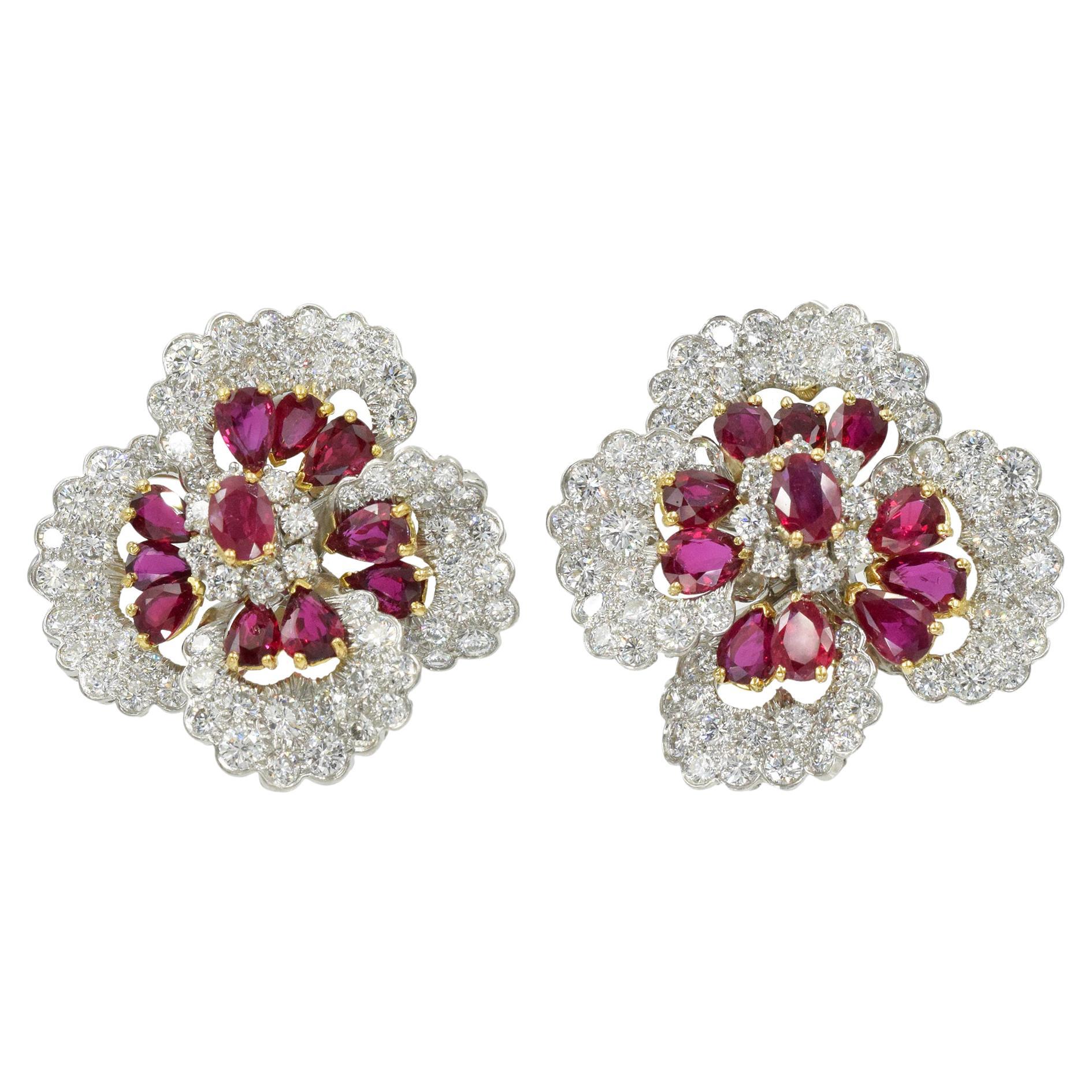 Oscar Heyman diamond and ruby earrings. This pair of earrings has 22 rubies approximately 7-8 carats and 144 diamonds total weight approximately 16- 17 carats top quality diamonds
 Color: E/F Clarity: VVS  set in platinum and numbered xxxxxxx
. 