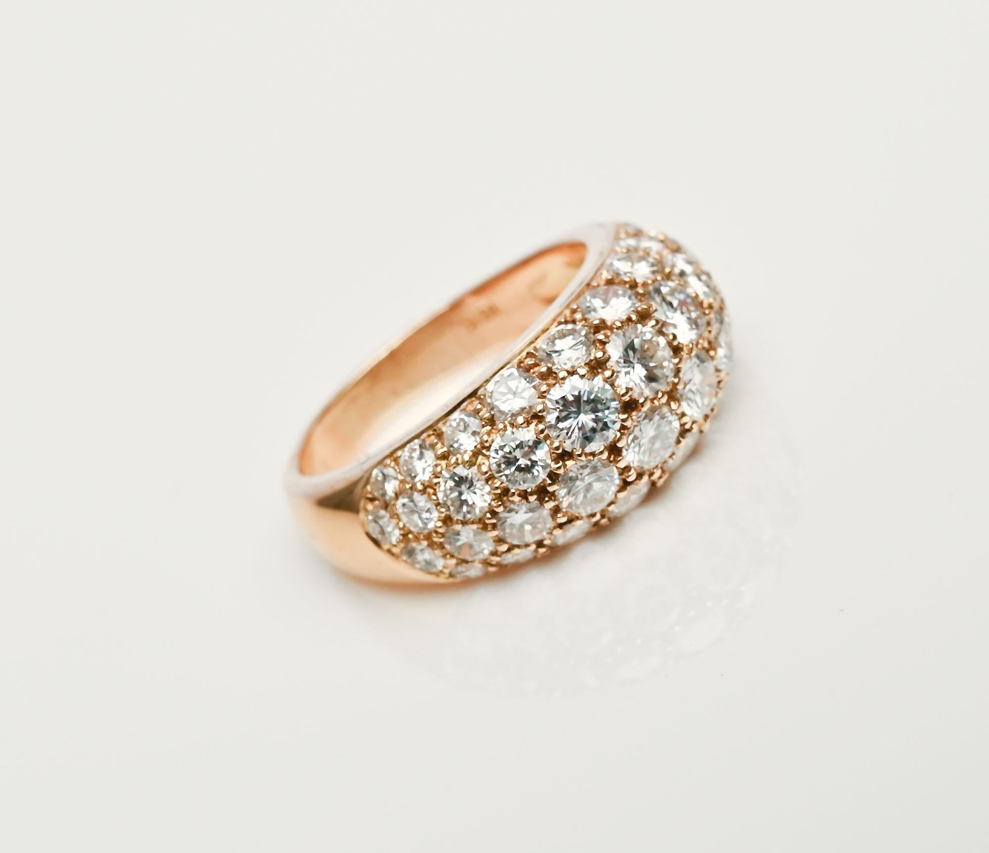 This Oscar Heyman diamond band ring is dazzling in its sparkle. It has four rows of  G color, VS quality diamonds. The 40 stones weigh a total of 2.7 carats. The ring is 3/8
