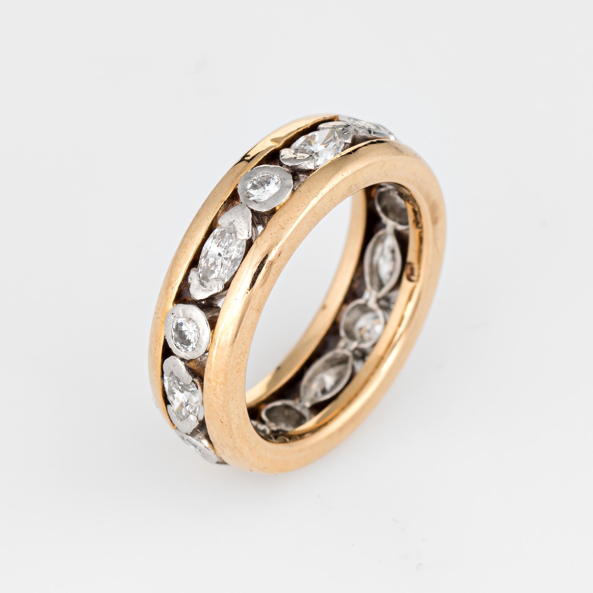 Stylish vintage Oscar Heyman diamond eternity ring crafted in 18 karat yellow gold and platinum. 

The classic band features an alternating pattern of marquise & round cut diamonds set in platinum bordered with the 18k yellow gold outer band. The