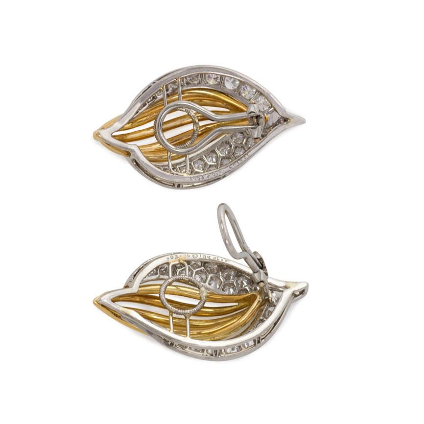 A pair of gold wirework and pavé diamond earrings in the form of a stylized flame, in 18K and platinum. Oscar Heyman, #708784.  Atw 2.20 cts.