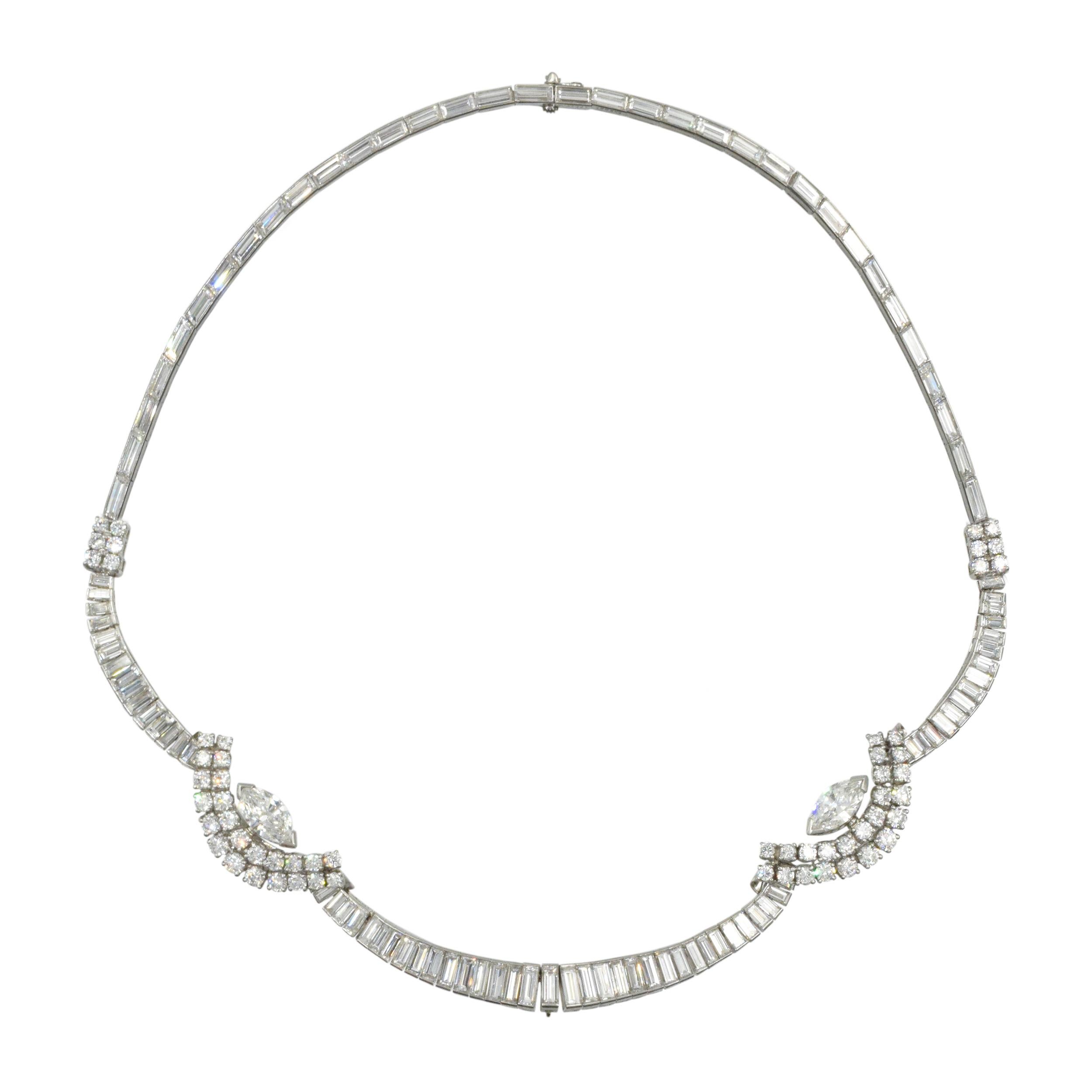 Oscar Heyman Diamond necklace in  platinum. Consisting of 170 baguette cut diamonds and 37 round brilliant cut diamonds. Total diamond weight: is 30 carats   Baguette cut diamonds horizontally channel set around the neck and vertically on the front.