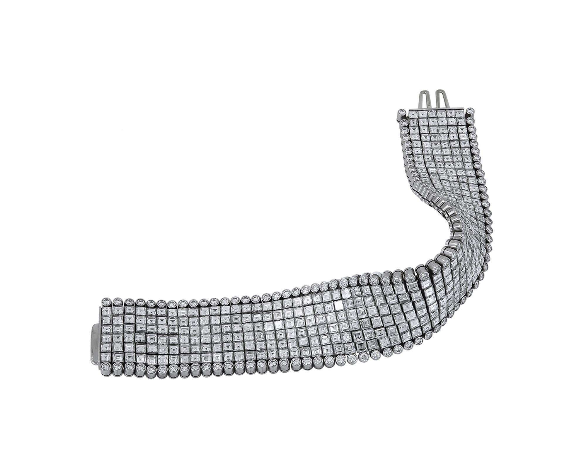 A stunning bracelet created by Oscar Heyman.
It's decorated with mixed shape diamonds and mounted in platinum. 
265 ascher cut diamonds with the total weight of 45.25 carats.
106 round diamonds weighing 6.63 carats total.
The diamonds are equivalent