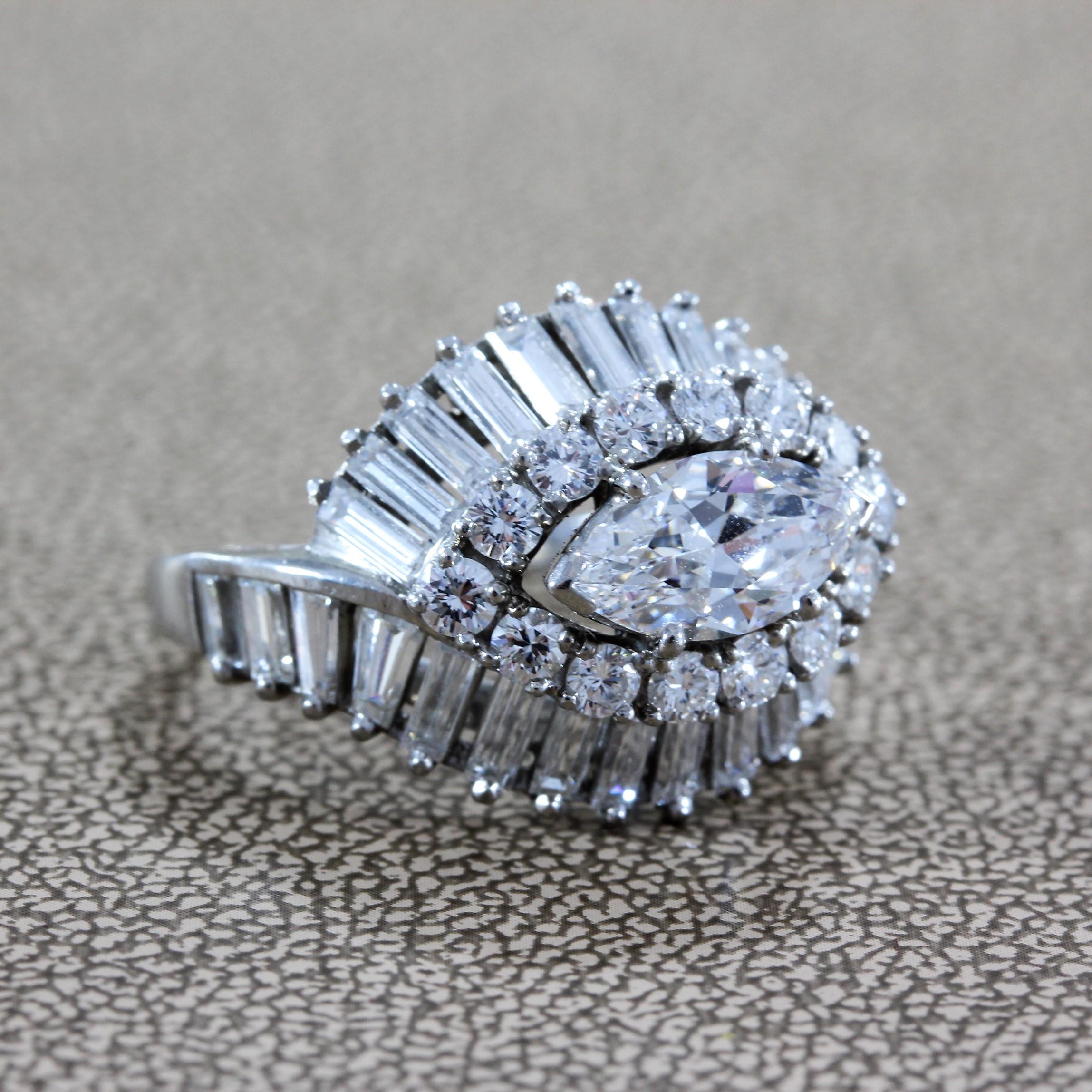An elegant diamond ring by Oscar Heyman featuring a 1.35 carat marquise shape diamond, with a halo of round cut diamonds and baguettes running along the top and bottom. Set in platinum.
 
Ring Size 7 