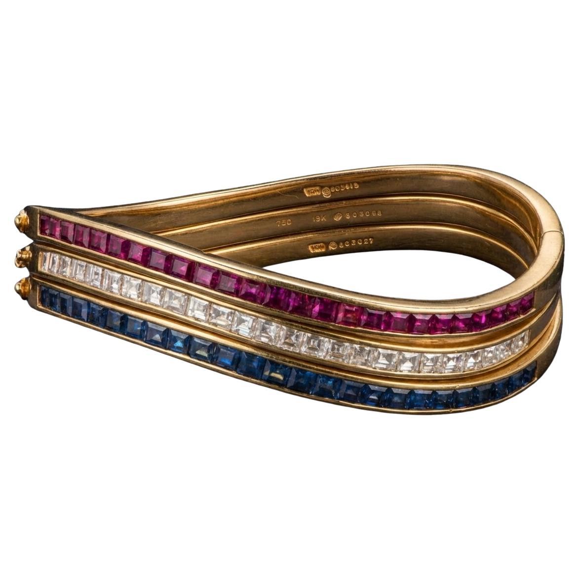 Bracelets en or jaune 18 carats, diamants, rubis et saphirs d'Oscar Heyman en vente