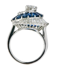 Oscar Heyman Diamond Sapphire Platinum Swirl Ring GIA, circa 1965