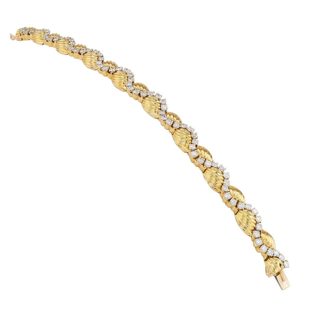 Oscar Heyman diamond yellow gold link bracelet circa 1970.  Love it because it caught your eye, and we are here to connect you with beautiful and affordable jewelry.  It is time to claim a special reward for Yourself!  Simple and concise information