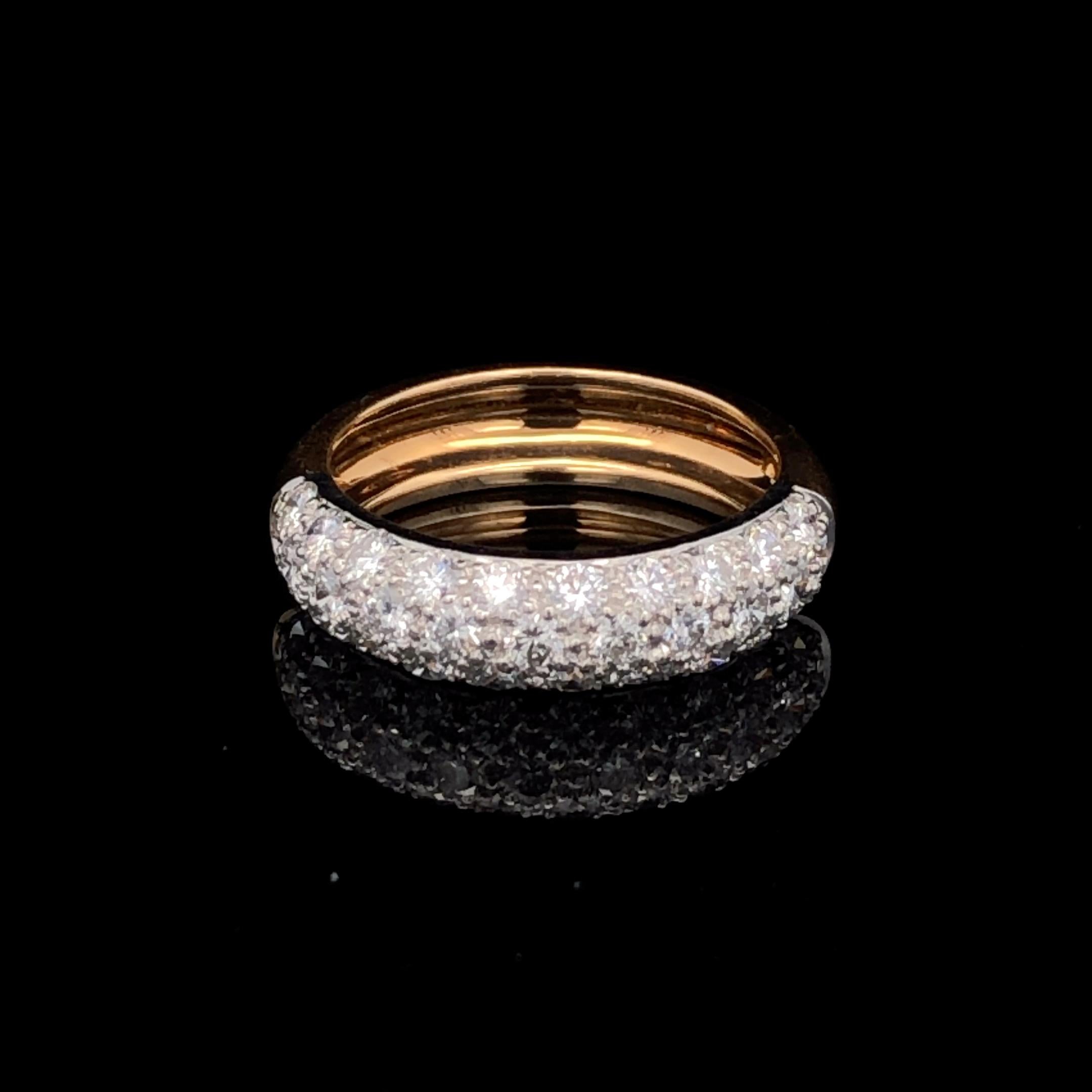 Oscar Heyman 18kt yellow gold & platinum diamond band ring contains 31 Round Diamonds (F-G/ VS+ quality) weighing 1.12cts that are bead set. It is 4mm wide and stamped with the makers mark, 18K PLAT, and serial number K5546. Half the band is gold