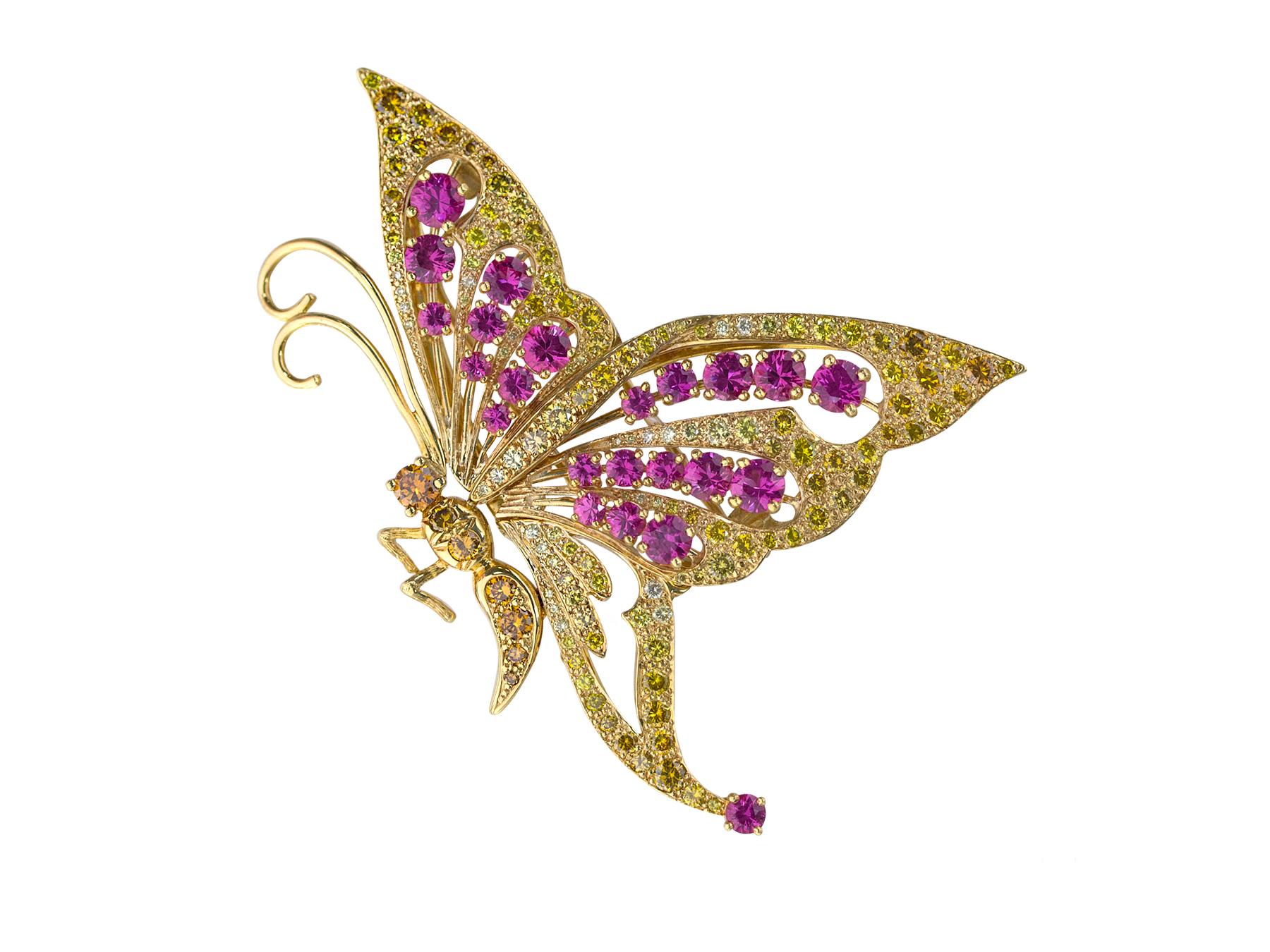Oscar Heyman 18k yellow gold butterfly brooch contains 23 Round Pink Sapphires (4.29cts) and 132 Fancy Yellow Diamonds (3.01cts). It is stamped with the makers mark, 18K, and serial number 200683. It is an ideal for a brooch lover looking for an