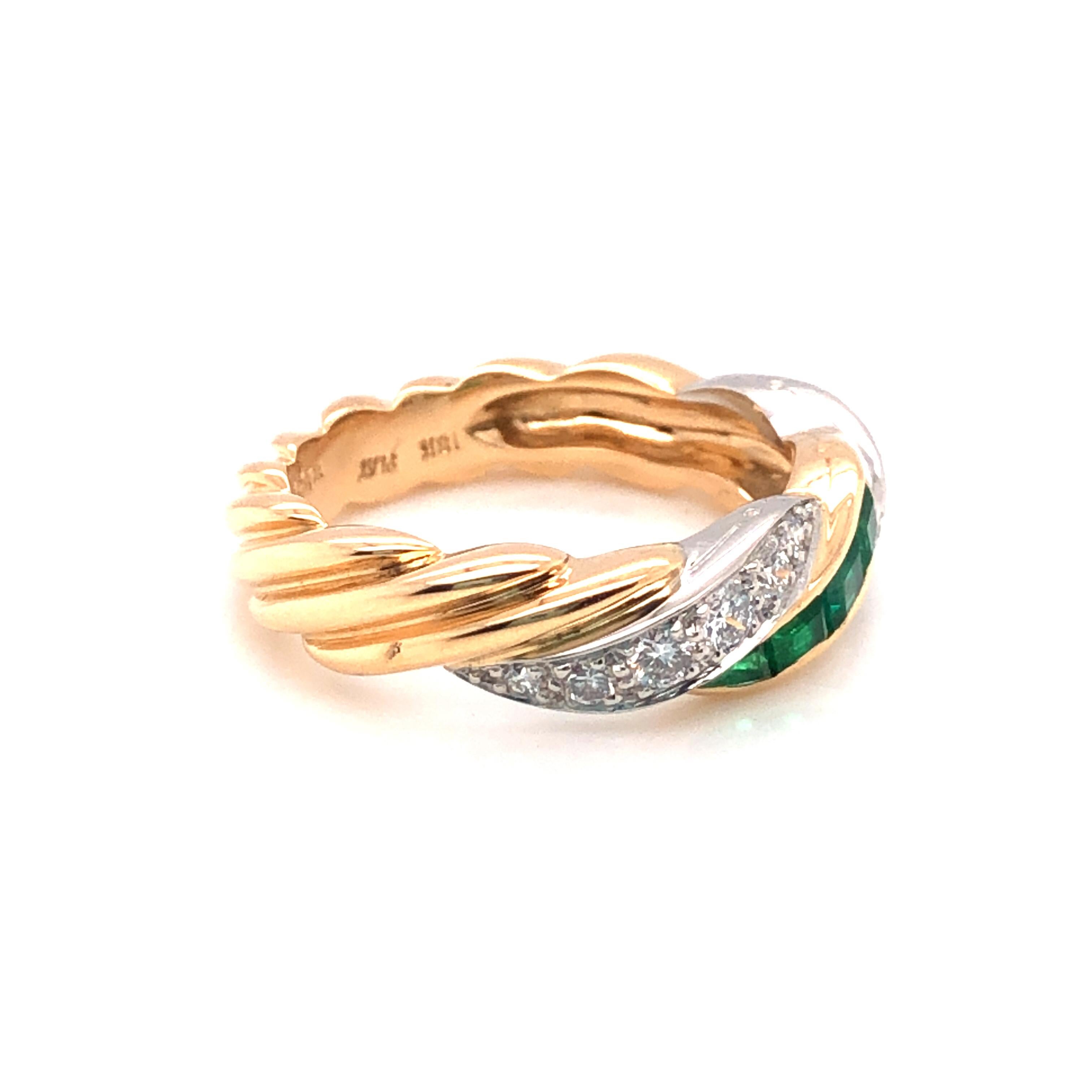 Oscar Heyman 18k yellow gold and platinum square emerald (0.40tcw) and round diamond (0.37tcw ) twist partway wedding band ring. It is stamped with the makers mark, 18K PLAT, and serial number J1712. Top of the ring is 6mm wide and tapers at the