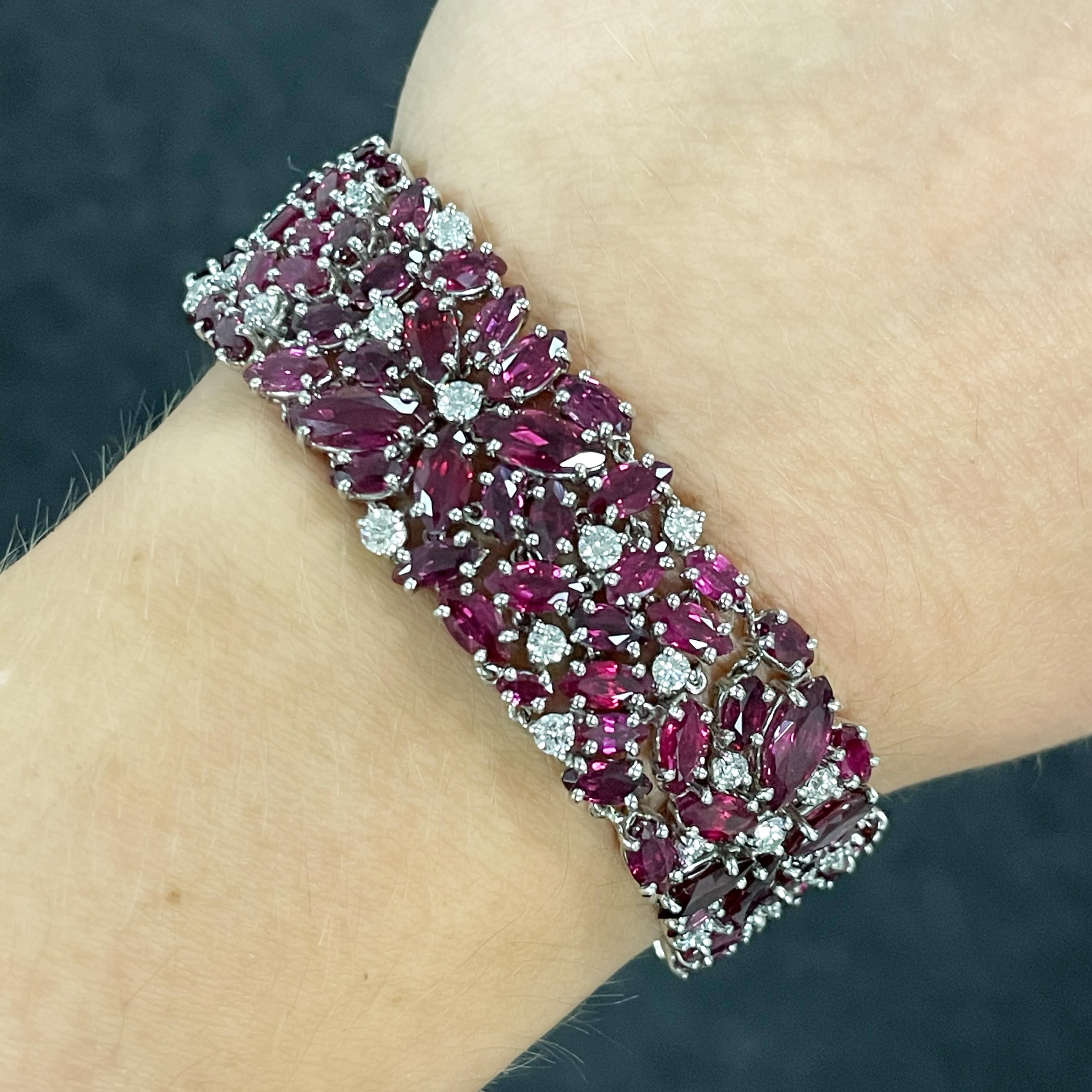 Oscar Heyman platinum bracelet contains 143 marquise rubies (CDC report indicated a mix of Burma and Thai origins) weighing 42.88tcw and 49 round diamonds (F-G/VS quality) weighing 2.92tcw. It is stamped with the makers mark, IRID PLAT, and serial