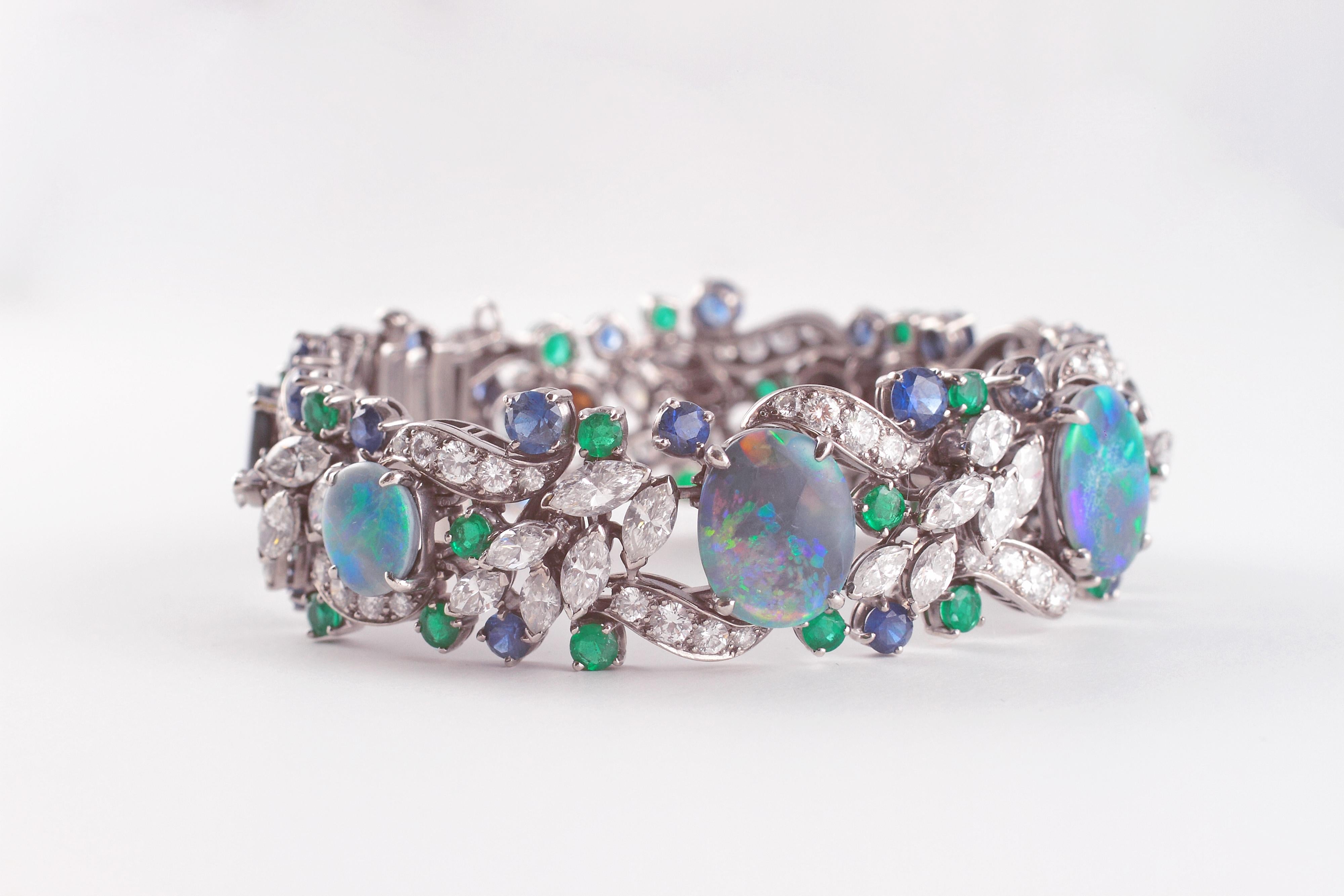 Breathtaking!  That is exactly what this bracelet is!  By famed jewelry house Oscar Heyman, this splendid platinum bracelet supports 44 marquise diamonds with a total weight of 8.87 carats, 25 round sapphires at 6.11 carats total weight, 31 round